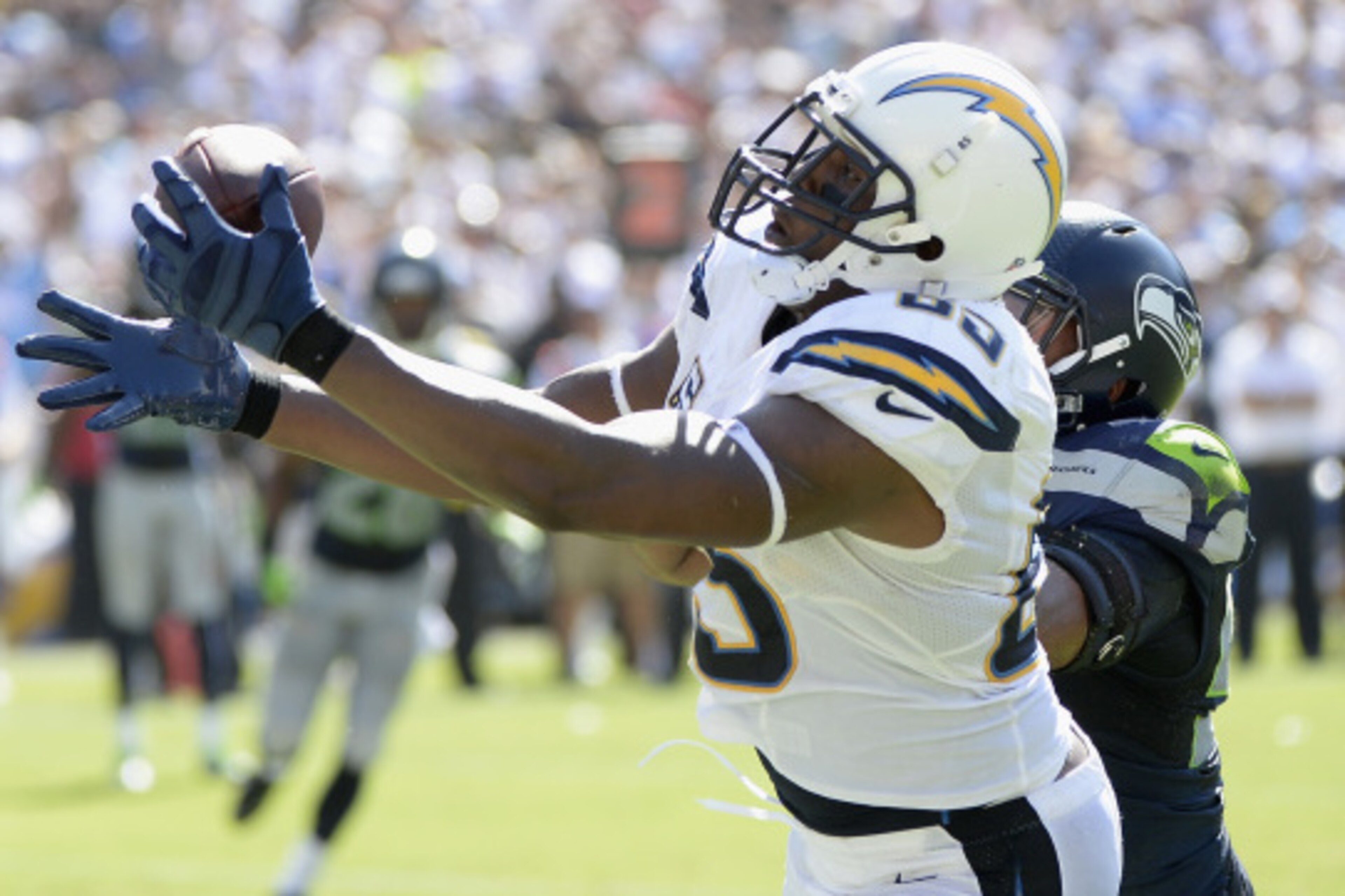 SAN DIEGO, CA - SEPTEMBER 14:  Tight end Antonio Gates #85 of the San Diego Chargers catches a touchdown pass while defended by outside linebacker K.J. Wright #50 of the Seattle Seahawks at Qualcomm Stadium on September 14, 2014 in San Diego, California. 