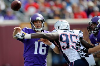 MINNEAPOLIS, MN - SEPTEMBER 14: Matt Cassel #16 of the Minnesota Vikings pass the ball under pressure from Chandler Jones #95 of the New England Patriots during the fourth quarter of the game on September 14, 2014 at TCF Bank Stadium in Minneapolis, Minne