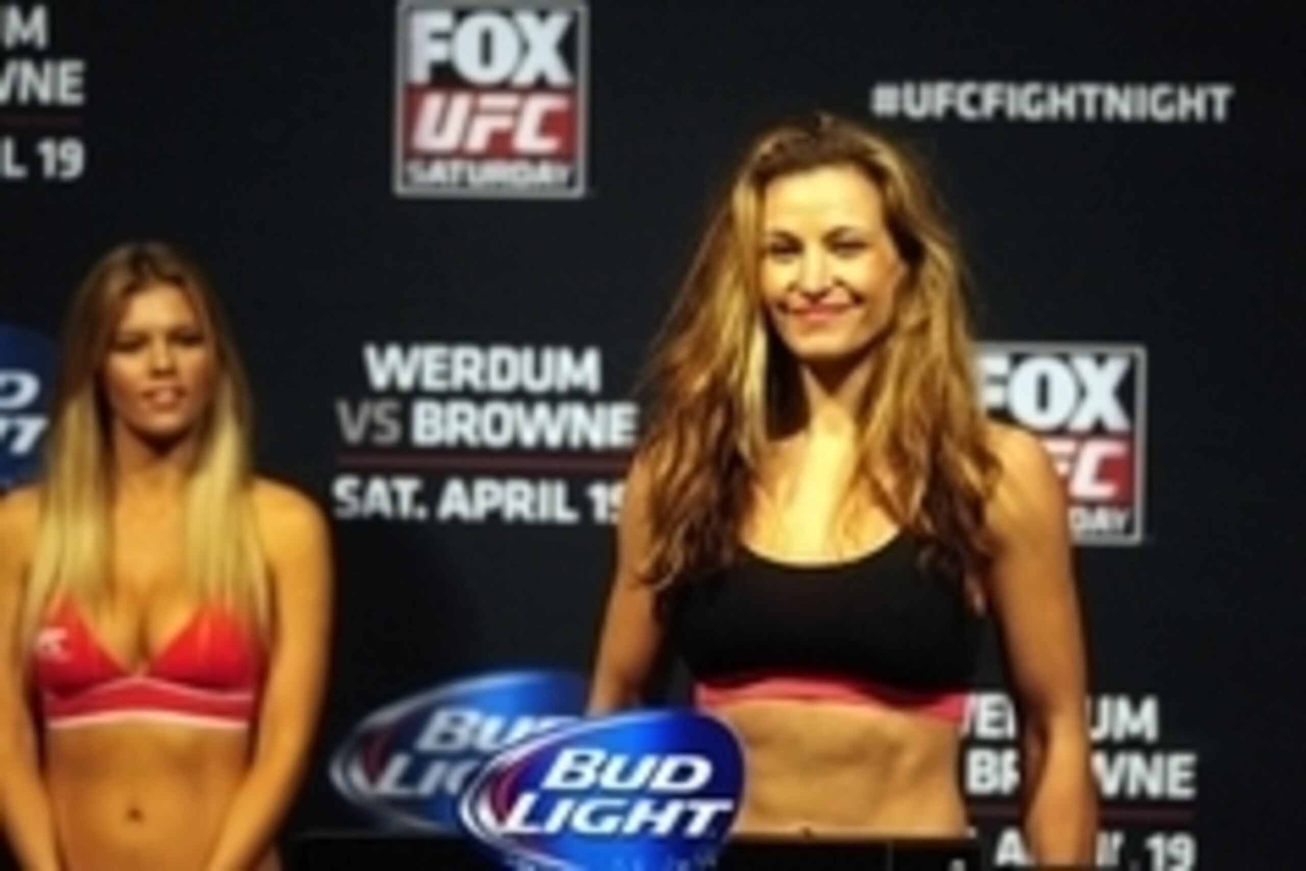Apr 18, 2014; Orlando, FL, USA; Miesha Tate steps on the scale during a weigh-in her female bantamweight fight against Liz Carmouche for UFC on FOX 11at Amway Center. Mandatory Credit: David Manning-USA TODAY Sports