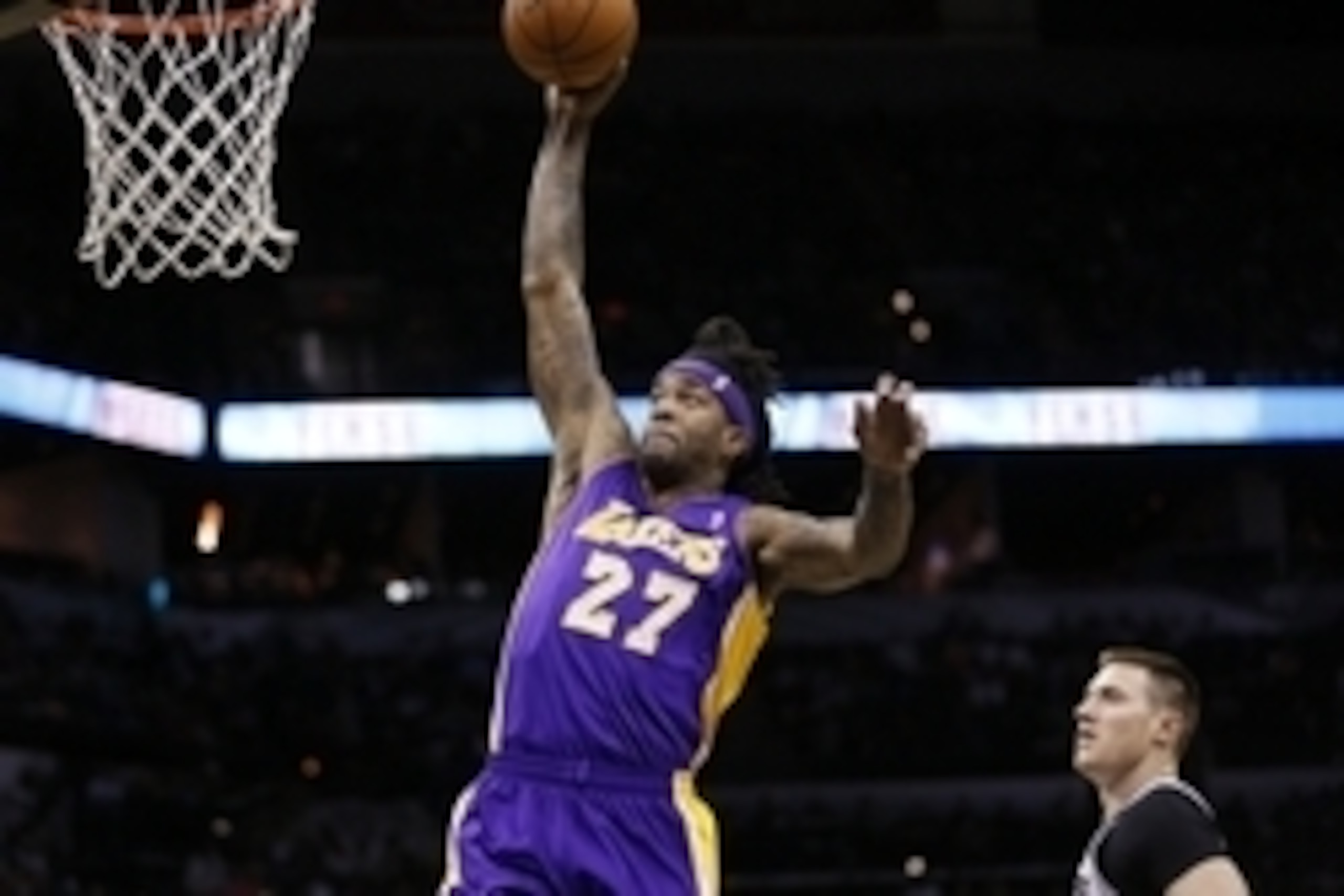 Apr 16, 2014; San Antonio, TX, USA; Los Angeles Lakers forward Jordan Hill (27) dunks the ball against the San Antonio Spurs during the first half at AT&T Center. Mandatory Credit: Soobum Im-USA TODAY Sports