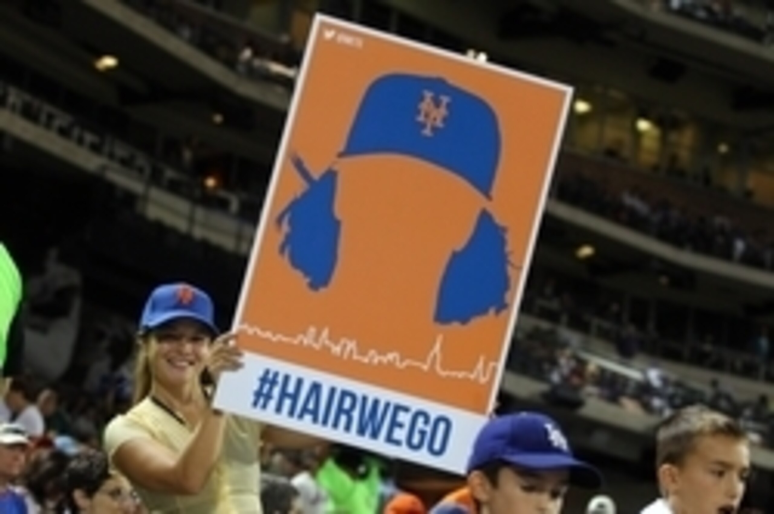 Aug 29, 2014; New York, NY, USA; A fan cheers on New York Mets starting pitcher Jacob deGrom (not pictured) with a sign that reads