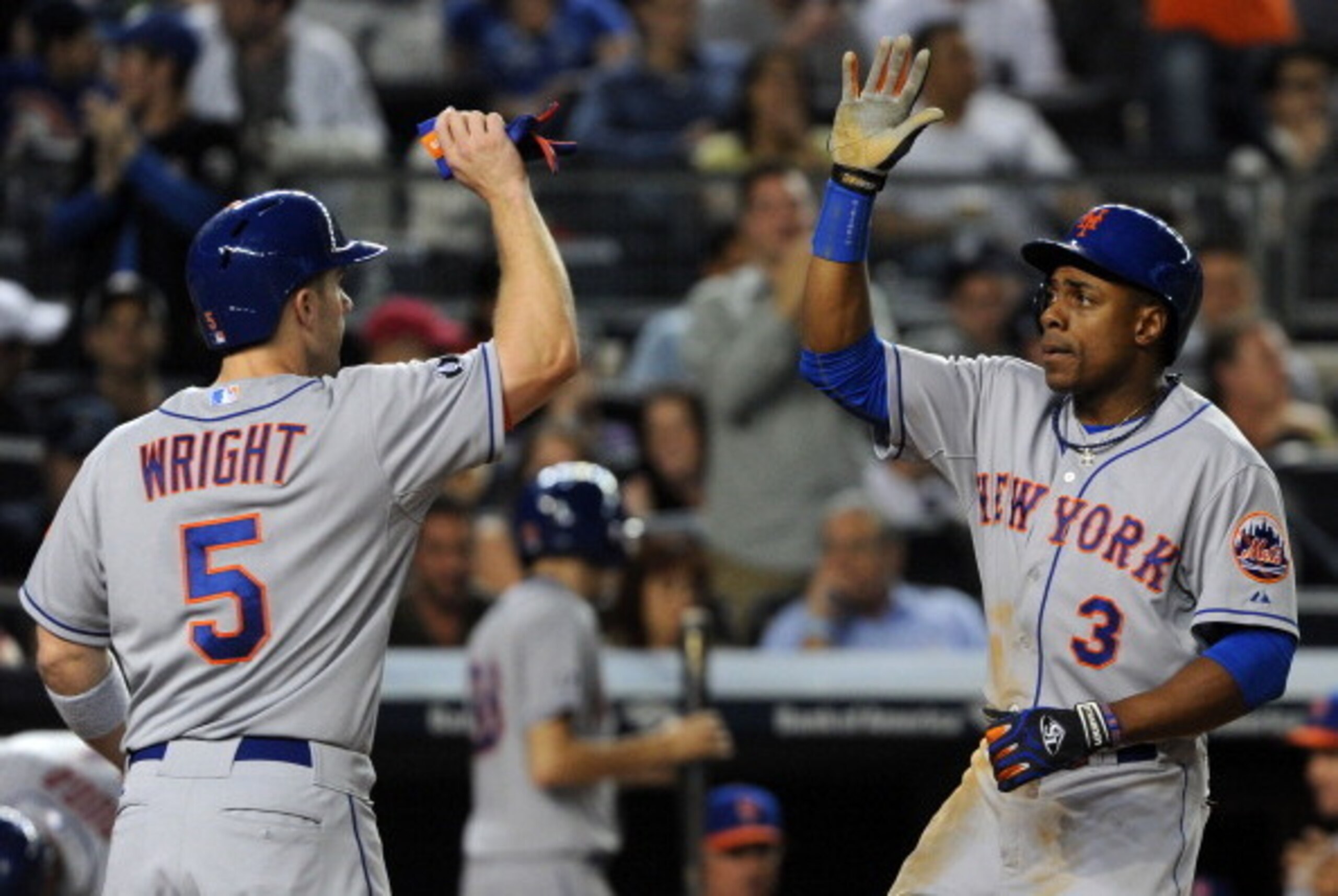 NEW YORK, NY - MAY 12:  Curtis Granderson #3 of the New York Mets is congratulated by David Wright #5 after hitting a two-run home run in the top of the sixth inning against the New York Yankees at Yankee Stadium on May 12, 2014 in the Bronx borough of Ne