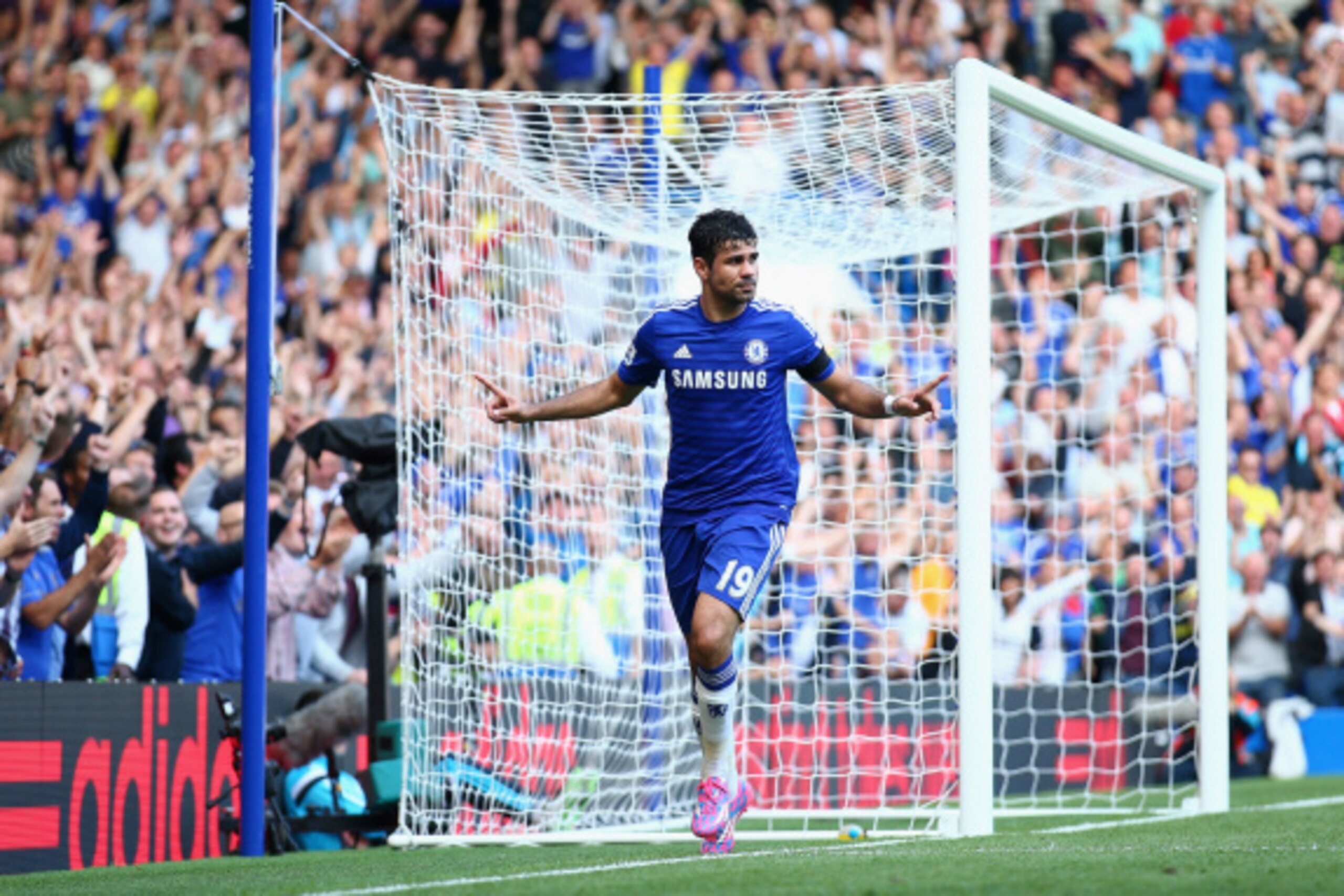 LONDON, ENGLAND - SEPTEMBER 13:  Diego Costa of Chelsea celebrates after scoring his and his team's second goal during the Barclays Premier League match between Chelsea and Swansea City at Stamford Bridge on September 13, 2014 in London, England.  (Photo 