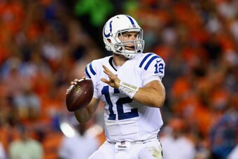 DENVER, CO - SEPTEMBER 07:  Quarterback Andrew Luck #12 of the Indianapolis Colts drops back to pass against the Denver Broncos at Sports Authority Field at Mile High on September 7, 2014 in Denver, Colorado.  (Photo by Jeff Gross/Getty Images)