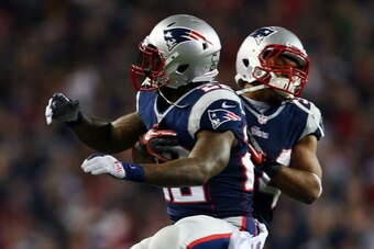 FOXBORO, MA - JANUARY 13:  Stevan Ridley #22 of the New England Patriots celebrates with Shane Vereen #34 after scoring a touchdown in the third quarter against the Houston Texans during the 2013 AFC Divisional Playoffs game at Gillette Stadium on January