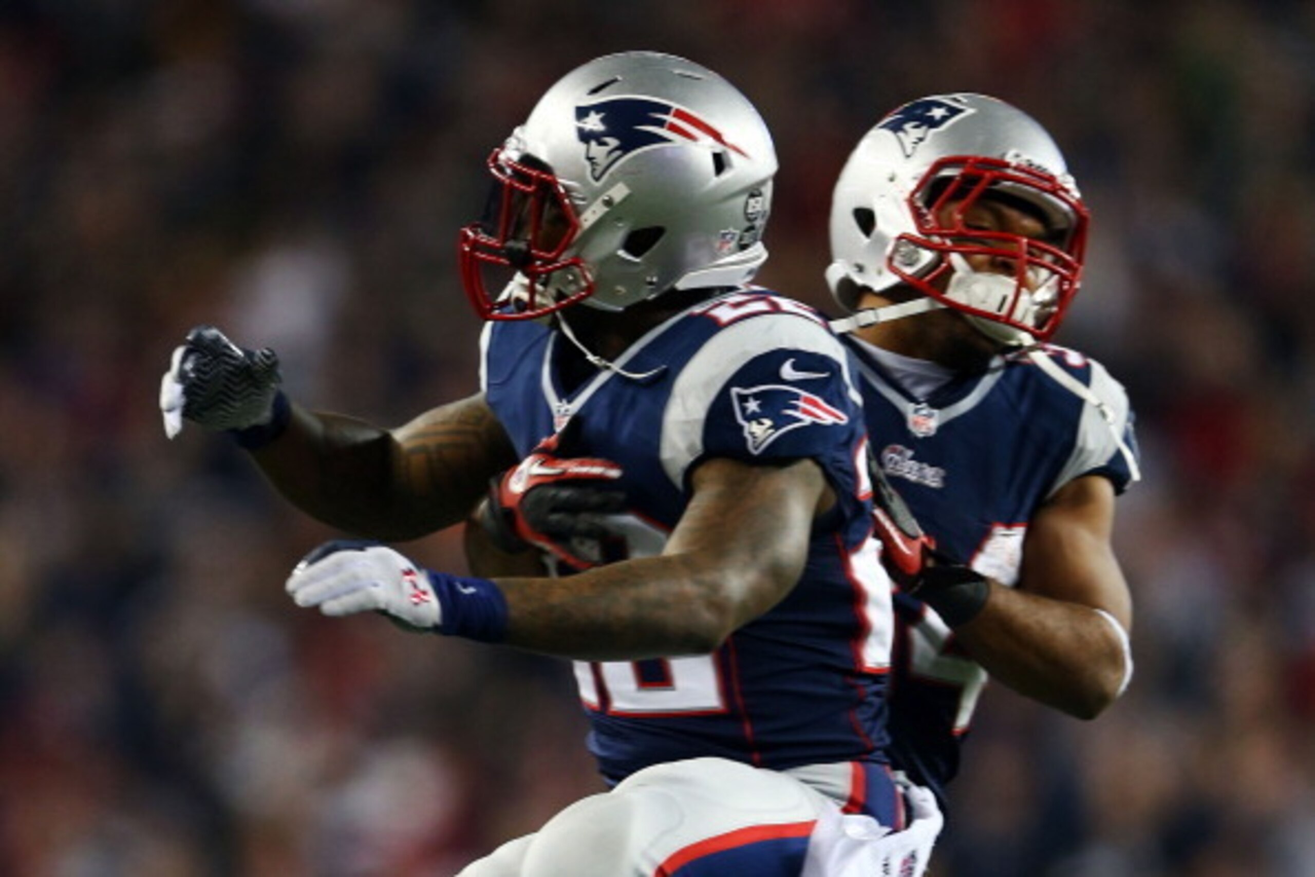 FOXBORO, MA - JANUARY 13:  Stevan Ridley #22 of the New England Patriots celebrates with Shane Vereen #34 after scoring a touchdown in the third quarter against the Houston Texans during the 2013 AFC Divisional Playoffs game at Gillette Stadium on January