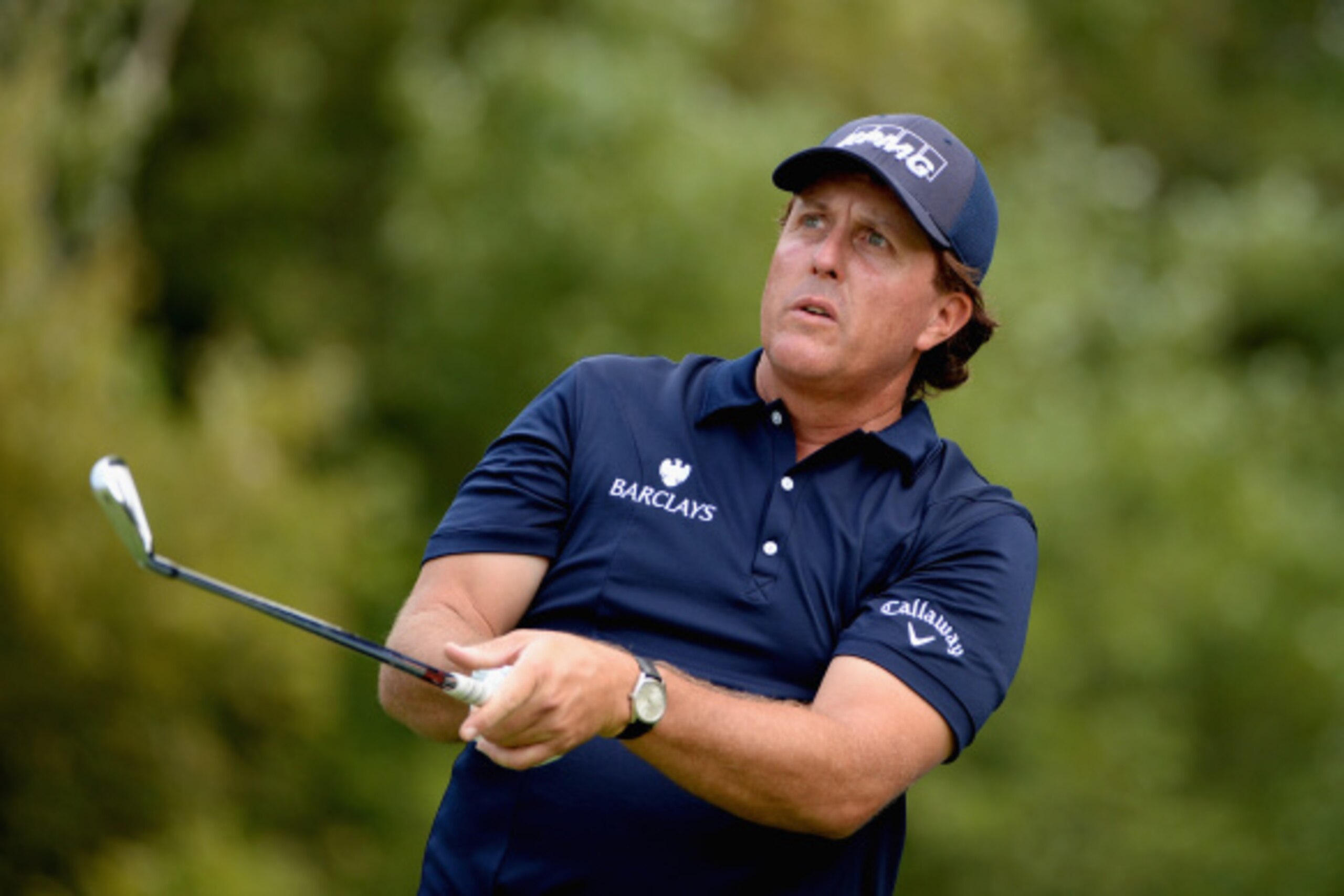 NORTON, MA - AUGUST 31:  Phil Mickelson watches his tee shot on the fourth hole during the third round of the Deutsche Bank Championship at the TPC Boston on August 31, 2014 in Norton, Massachusetts.  (Photo by Ross Kinnaird/Getty Images)