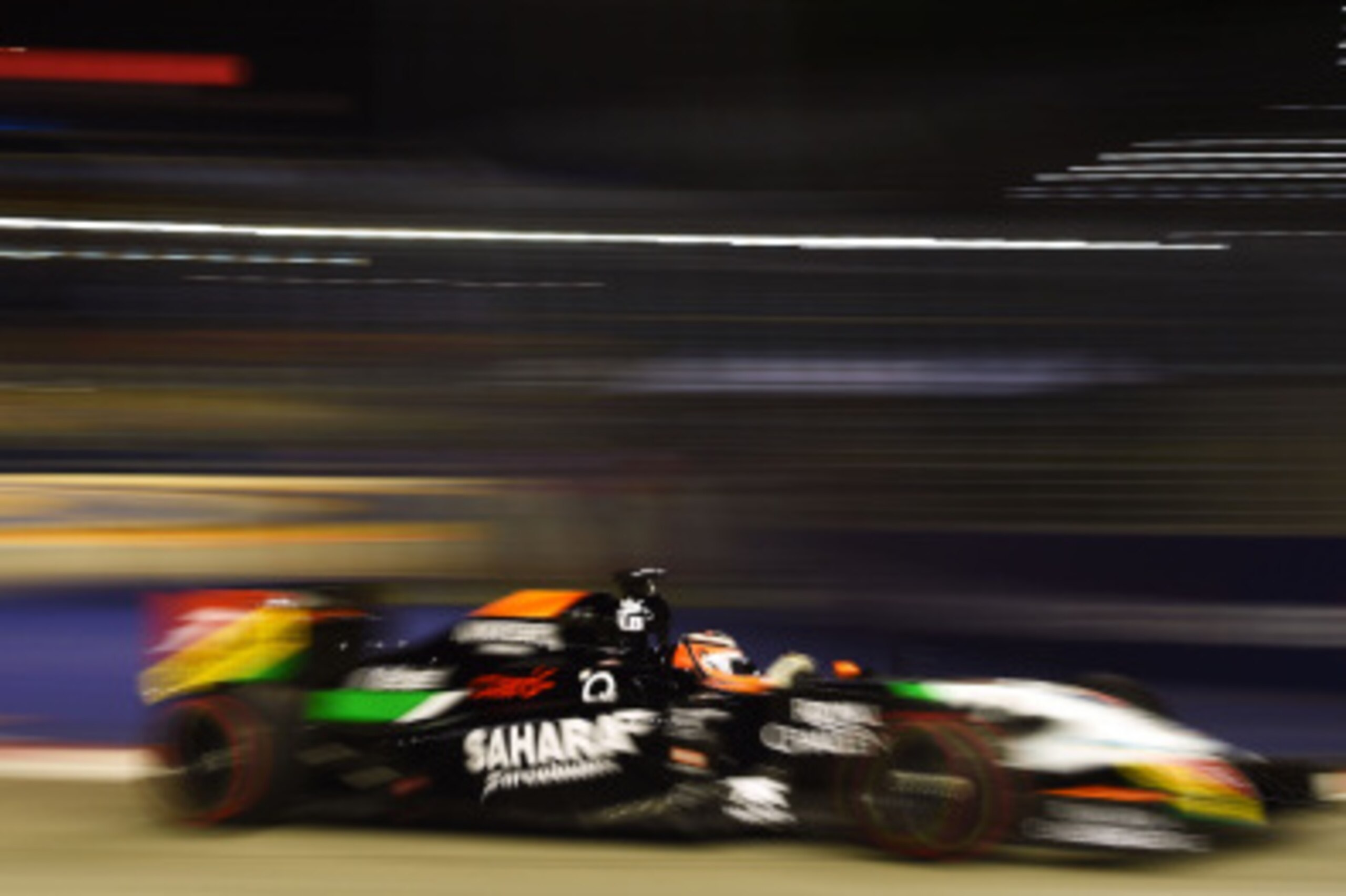 SINGAPORE - SEPTEMBER 19:  Nico Hulkenberg of Germany and Force India drives during practice ahead of the Singapore Formula One Grand Prix at Marina Bay Street Circuit on September 19, 2014 in Singapore, Singapore.  (Photo by Lars Baron/Getty Images)