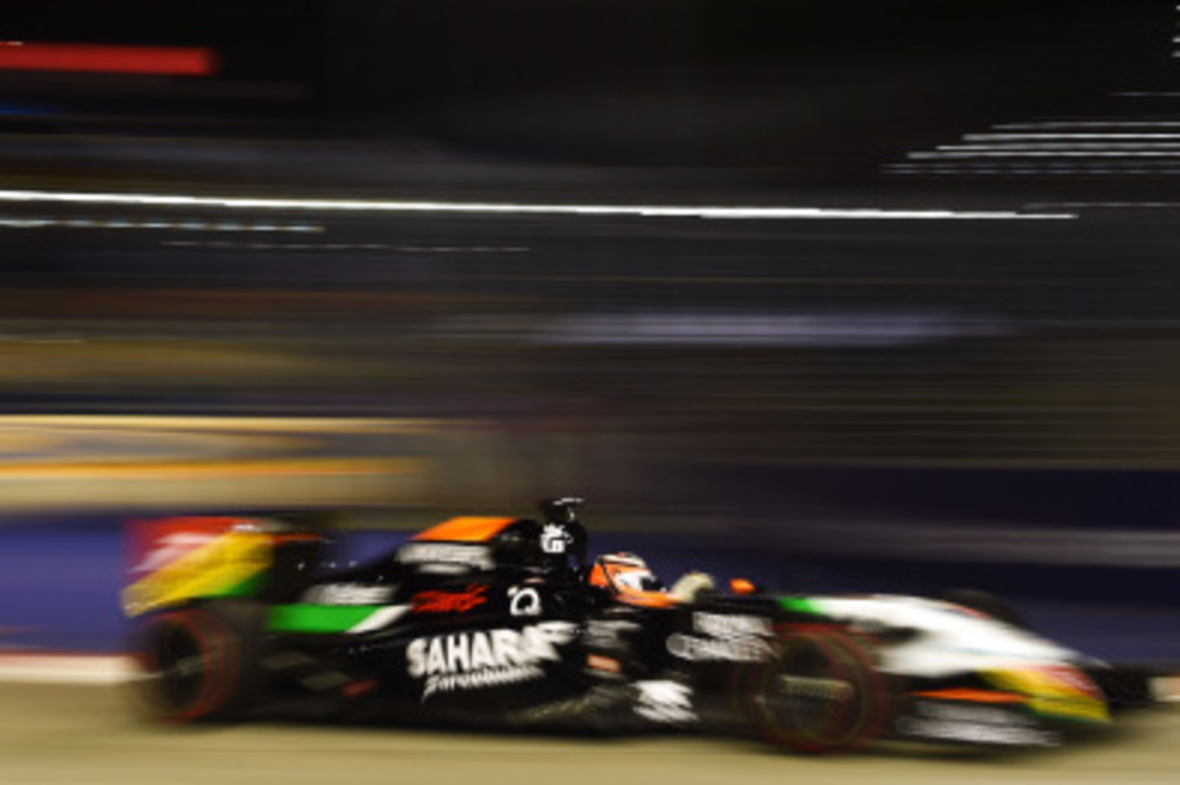 SINGAPORE - SEPTEMBER 19: Nico Hulkenberg of Germany and Force India drives during practice ahead of the Singapore Formula One Grand Prix at Marina Bay Street Circuit on September 19, 2014 in Singapore, Singapore. (Photo by Lars Baron/Getty Images) SINGAPORE - SEPTEMBER 19: Nico Hulkenberg of Germany and Force India drives during practice ahead of the Singapore Formula One Grand Prix at Marina Bay Street Circuit on September 19, 2014 in Singapore, Singapore. (Photo by Lars Baron/Getty Images)