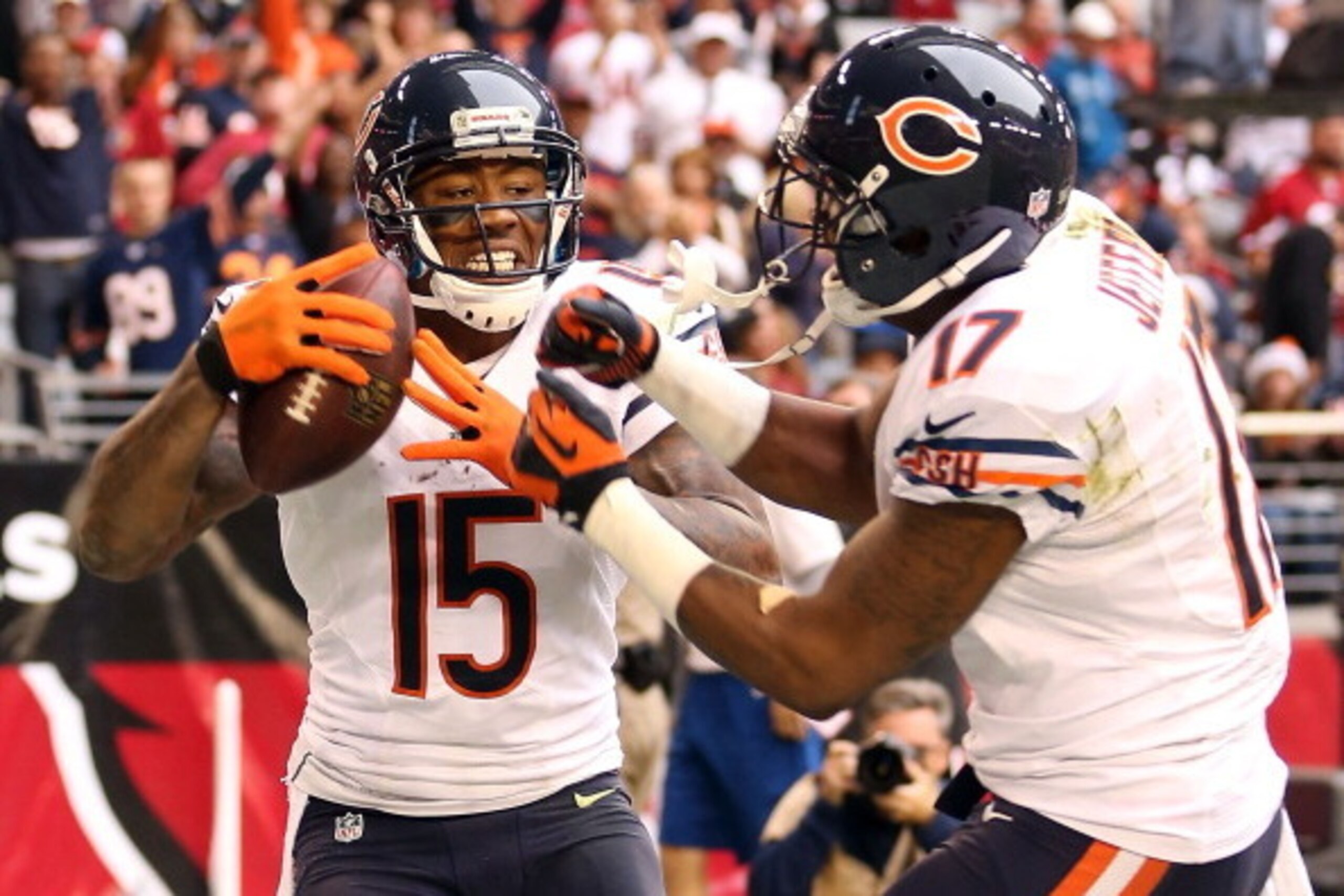 GLENDALE, AZ - DECEMBER 23:  Wide receiver Brandon Marshall #15 of the Chicago Bears celebrates with wide receiver Alshon Jeffery #17 after a 11 yard touchdown reception against the Arizona Cardinals during the second quarter of the NFL game at the Univer