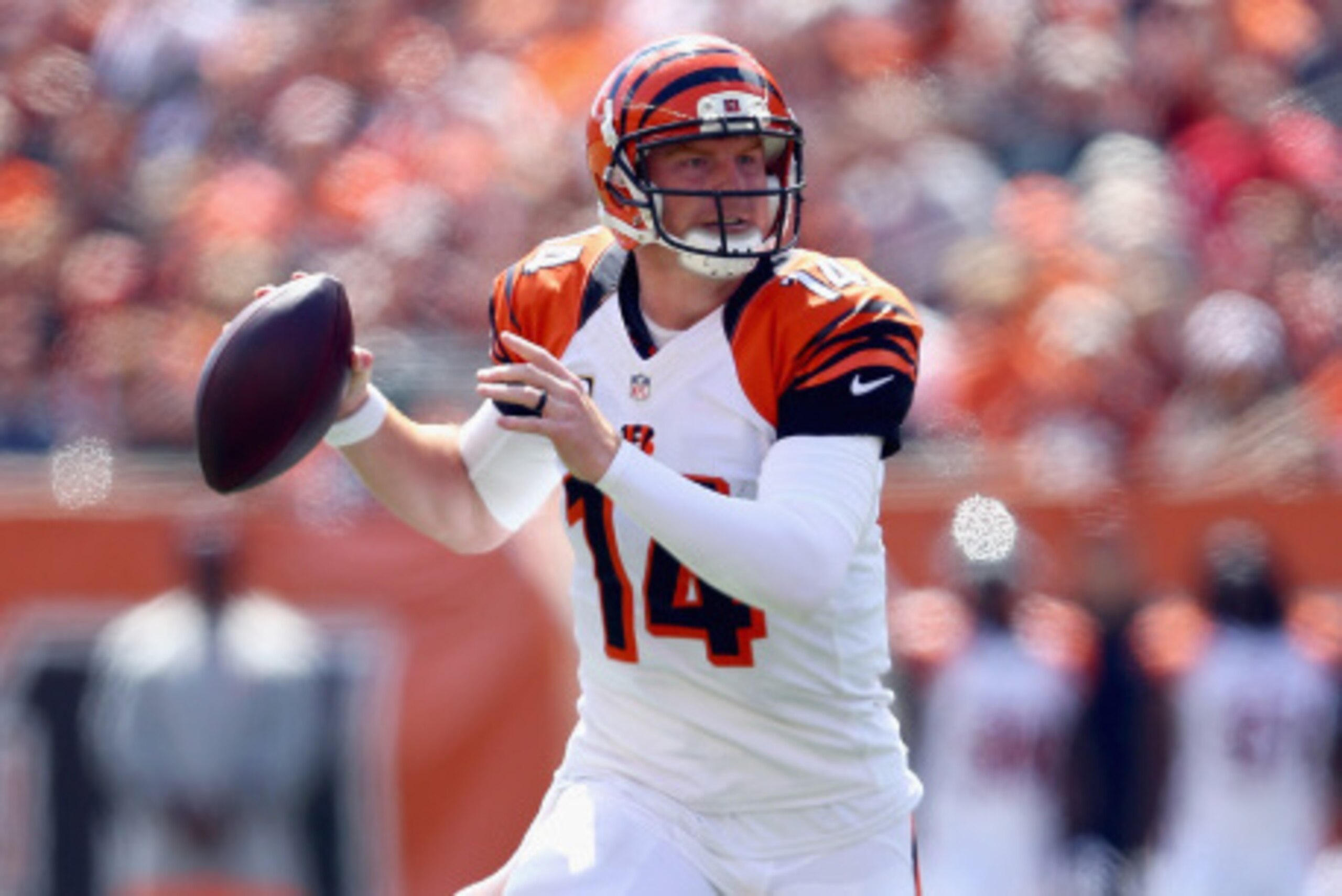 CINCINNATI, OH - SEPTEMBER 14:  Andy Dalton #14 of the Cincinnati Bengals looks to pass the ball during the game against the Atlanta Falcons  at Paul Brown Stadium on September 14, 2014 in Cincinnati, Ohio.  (Photo by Andy Lyons/Getty Images)