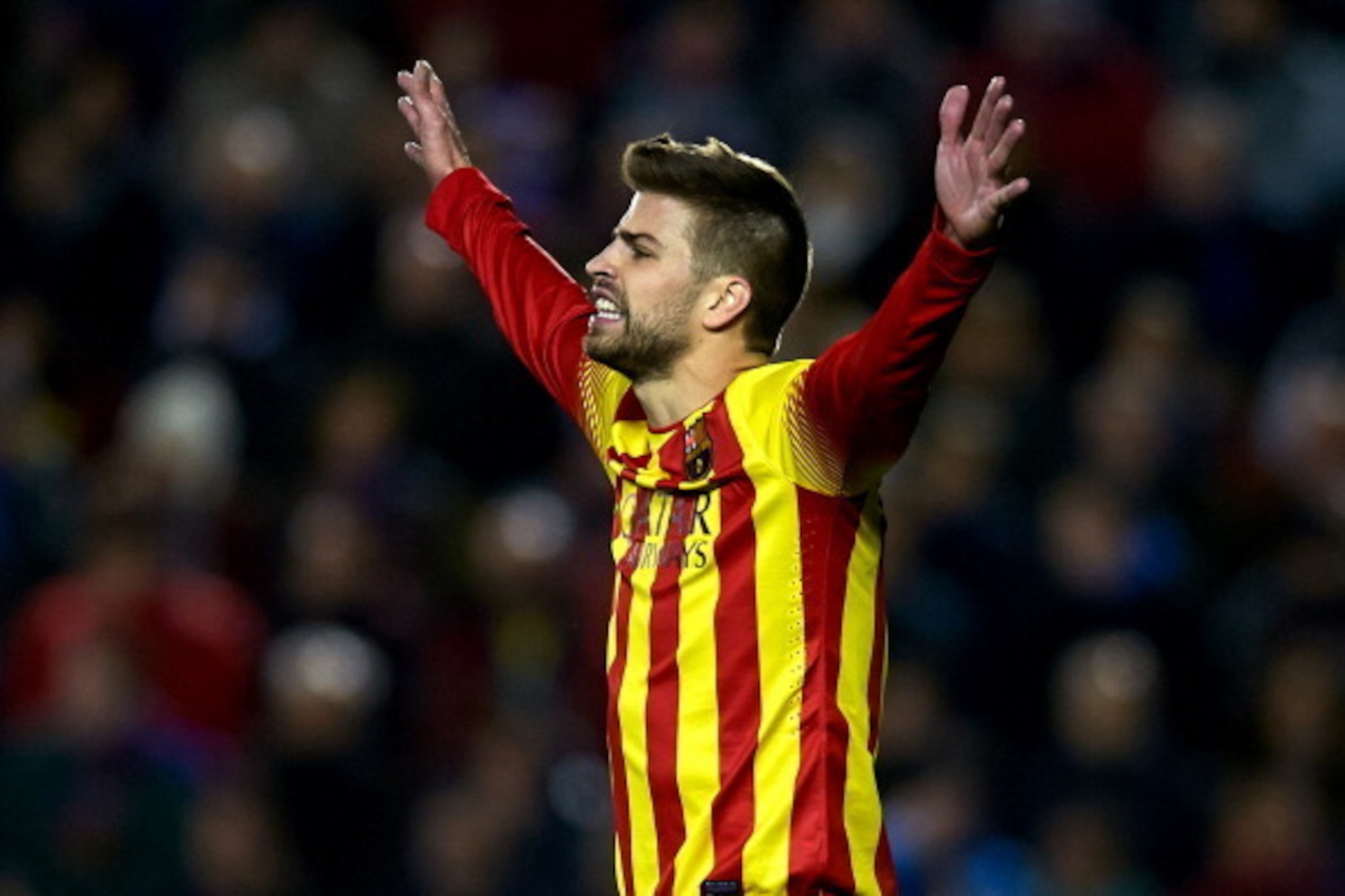 VALENCIA, SPAIN - JANUARY 19:  Gerard Pique of Barcelona reacts during the la Liga match between Levante UD and FC Barcelona at Ciutat de Valencia on January 19, 2014 in Valencia, Spain.  (Photo by Manuel Queimadelos Alonso/Getty Images)
