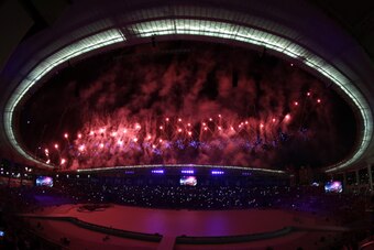 INCHEON, SOUTH KOREA - SEPTEMBER 19:  (EDITORS NOTE: THIS IMAGE WAS CREATED WITH A FISH EYE LENS) Fireworks explode during the Opening Ceremony ahead of the 2014 Asian Games at Incheon Asiad Main Stadium on September 19, 2014 in Incheon, South Korea.  (Ph