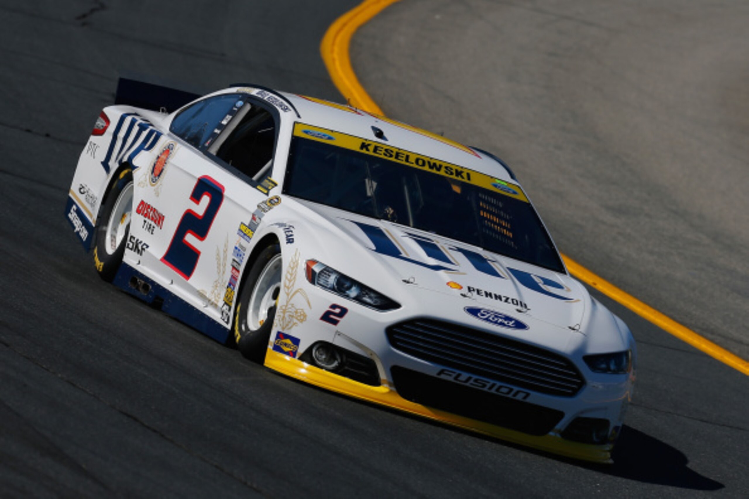 LOUDON, NH - SEPTEMBER 19:  Brad Keselowski, driver of the #2 Miller Lite Ford, practices for the NASCAR Sprint Cup Series Sylvania 300 at New Hampshire Motor Speedway on September 19, 2014 in Loudon, New Hampshire.  (Photo by Chris Trotman/Getty Images)