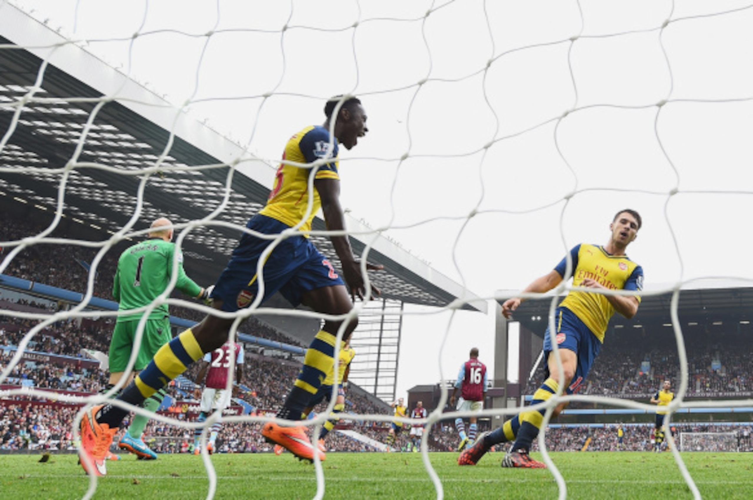 BIRMINGHAM, ENGLAND - SEPTEMBER 20: Danny Welbeck of Arsenal celebrates his team's second goal during the Barclays Premier League match between Aston Villa and Arsenal at Villa Park on September 20, 2014 in Birmingham, England. (Photo by Laurence Griffi BIRMINGHAM, ENGLAND - SEPTEMBER 20: Danny Welbeck of Arsenal celebrates his team's second goal during the Barclays Premier League match between Aston Villa and Arsenal at Villa Park on September 20, 2014 in Birmingham, England. (Photo by Laurence Griffi