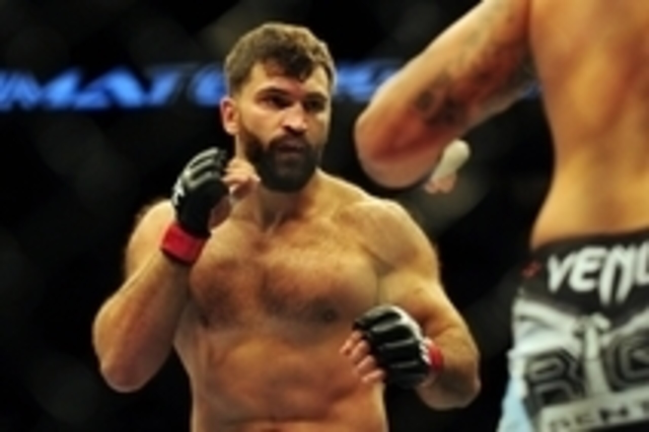 Jun 14, 2014; Vancouver, British Columbia, Canada; Andrei Arlovski (red) fights against Brendan Schuab (blue) in their heavyweight bout for UFC 174 at Rogers Arena. Mandatory Credit: Anne-Marie Sorvin-USA TODAY Sports