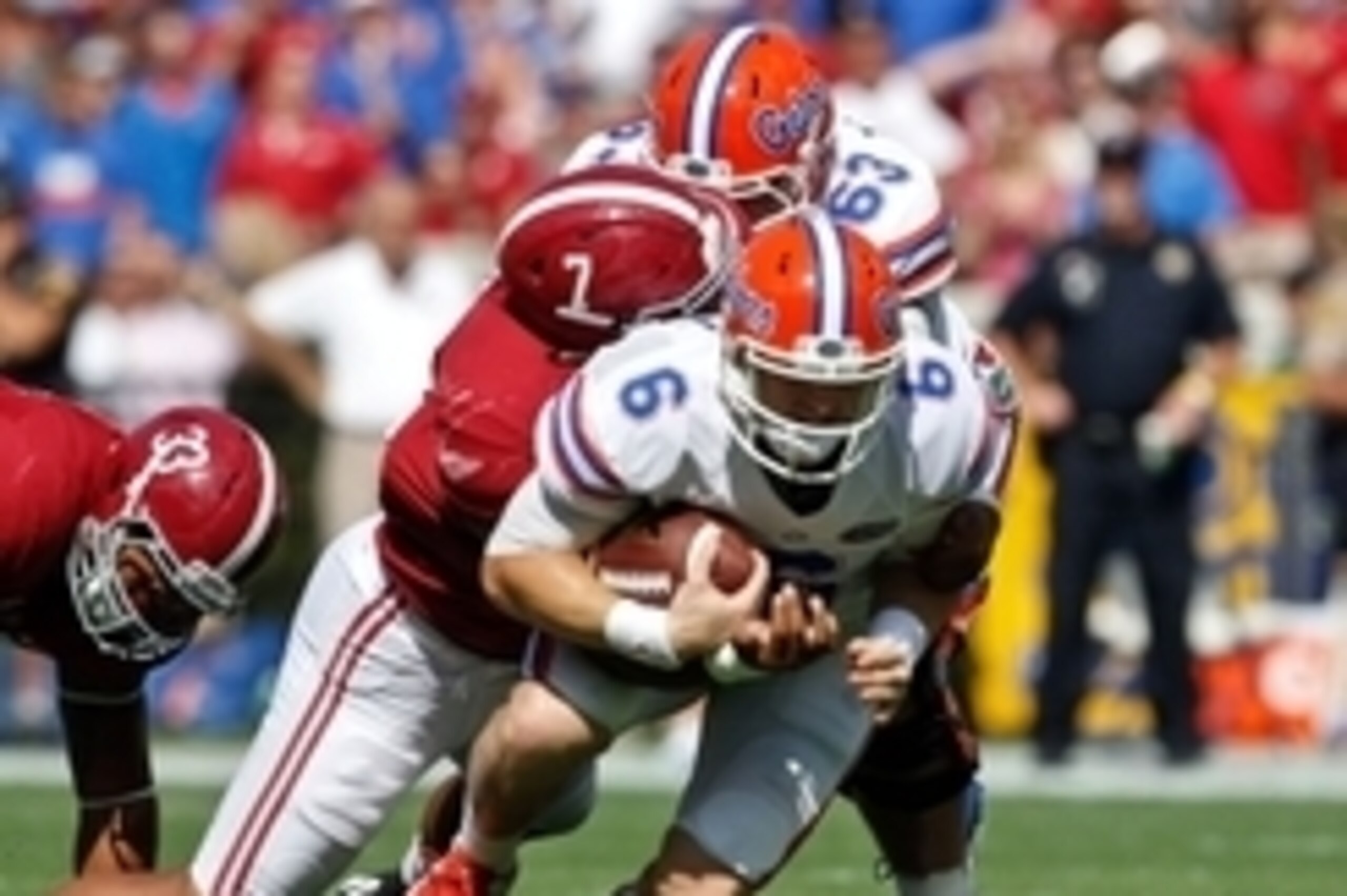 Sep 20, 2014; Tuscaloosa, AL, USA; Florida Gators quarterback Jeff Driskel (6) is tackled by Alabama Crimson Tide linebacker Ryan Anderson (7)  at Bryant-Denny Stadium. Mandatory Credit: Marvin Gentry-USA TODAY Sports