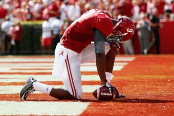 TUSCALOOSA, AL - SEPTEMBER 20:  Amari Cooper #9 of the Alabama Crimson Tide reacts after taking a reception in for a touchdown against the Florida Gators at Bryant-Denny Stadium on September 20, 2014 in Tuscaloosa, Alabama.  (Photo by Kevin C. Cox/Getty I