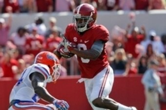 Sep 20, 2014; Tuscaloosa, AL, USA; Alabama Crimson Tide wide receiver Amari Cooper (9) carries the ball as Florida Gators linebacker Antonio Morrison (3) pursues him at Bryant-Denny Stadium. Mandatory Credit: Marvin Gentry-USA TODAY Sports