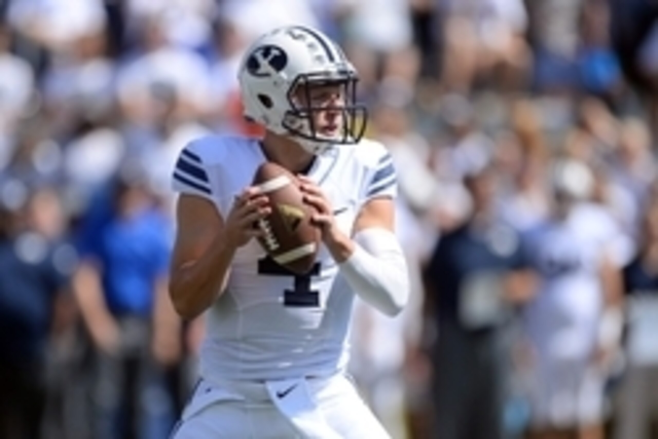 Sep 20, 2014; Provo, UT, USA; Brigham Young Cougars quarterback Taysom Hill (4) drops back to pass against the Virginia Cavaliers during the first half at Lavell Edwards Stadium. Mandatory Credit: Joe Camporeale-USA TODAY Sports