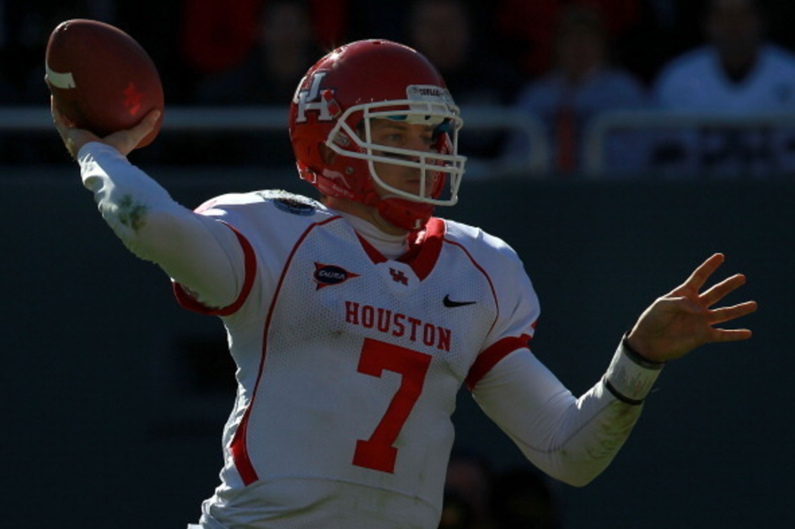 DALLAS, TX - JANUARY 02:  Case Keenum #7 of the Houston Cougars throws against the Penn State Nittany Lions during the TicketCity Bowl at Cotton Bowl Stadium on January 2, 2012 in Dallas, Texas.  (Photo by Ronald Martinez/Getty Images)