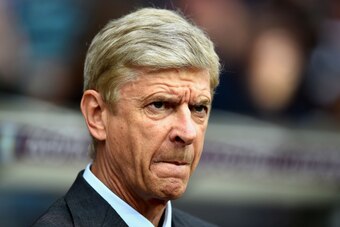 BIRMINGHAM, ENGLAND - SEPTEMBER 20:  Arsene Wenger, manager of Arsenal looks on during the Barclays Premier League match between Aston Villa and Arsenal at Villa Park on September 20, 2014 in Birmingham, England.  (Photo by Laurence Griffiths/Getty Images