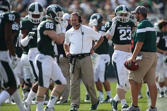 EAST LANSING, MI - SEPTEMBER 20:  Michigan State Spartans head football coach Mark Dantonio watches the action during the second half of the game against Eastern Michigan Eagles at Spartan Stadium on September 20, 2014 in East Lansing, Michigan. Michigan 