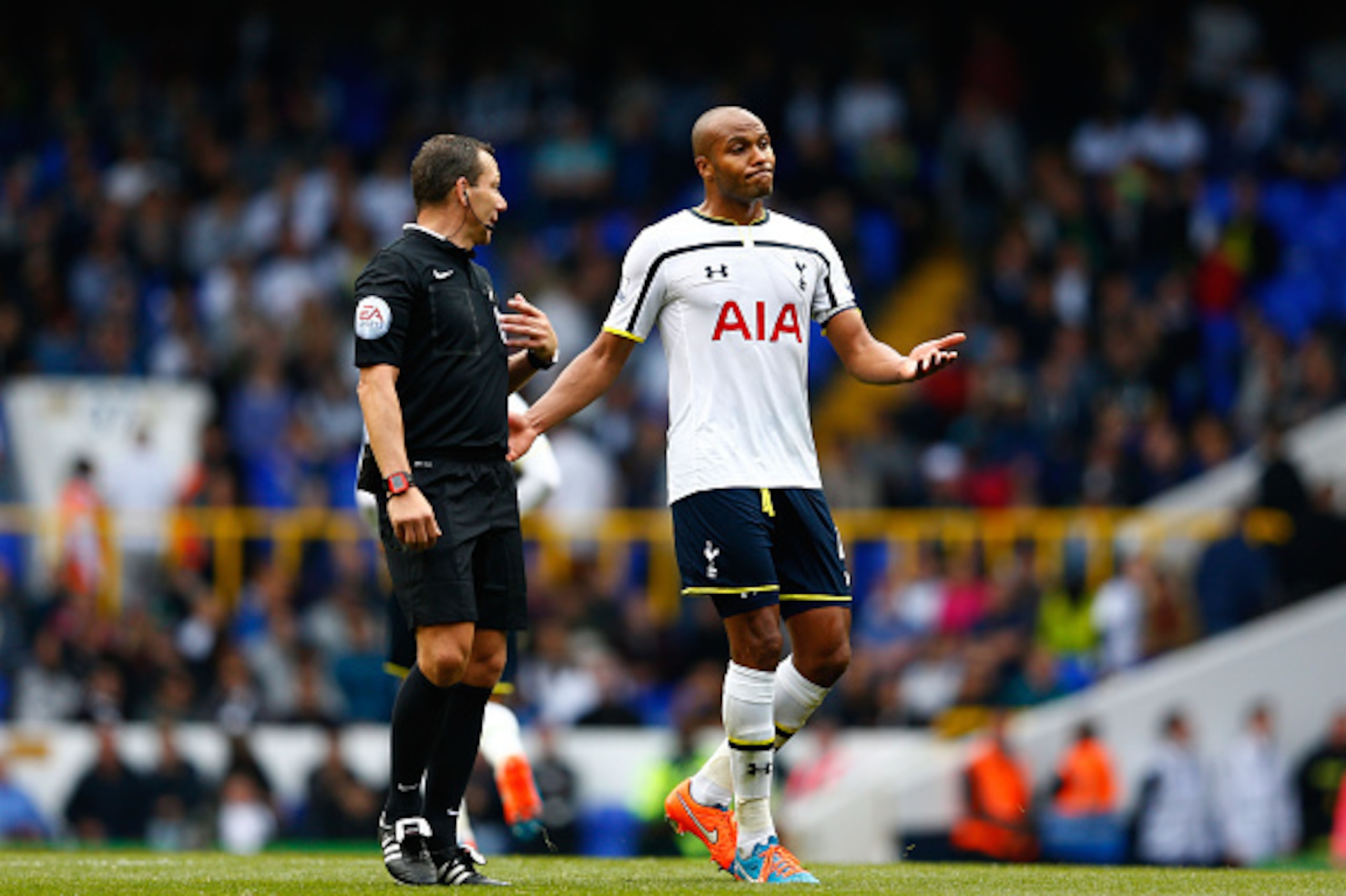 LONDON, ENGLAND - SEPTEMBER 21: A dejected Younes Kaboul of Spurs speaks with Referee Kevin Friend following his team's 1-0 defeat during the Barclays Premier League match between Tottenham Hotspur and West Bromwich Albion at White Hart Lane on September LONDON, ENGLAND - SEPTEMBER 21: A dejected Younes Kaboul of Spurs speaks with Referee Kevin Friend following his team's 1-0 defeat during the Barclays Premier League match between Tottenham Hotspur and West Bromwich Albion at White Hart Lane on September