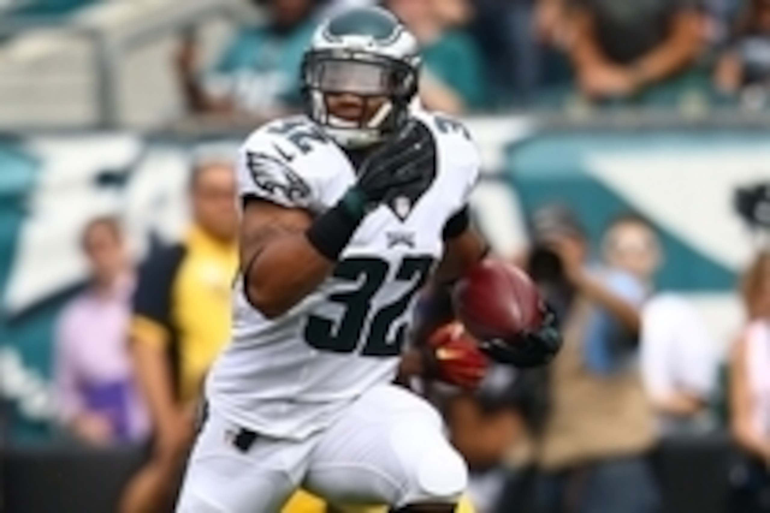 Sep 21, 2014; Philadelphia, PA, USA; Philadelphia Eagles running back Chris Polk (32) runs for a touchdown on a kickoff against the Washington Redskins at Lincoln Financial Field. Mandatory Credit: Jeffrey G. Pittenger-USA TODAY Sports