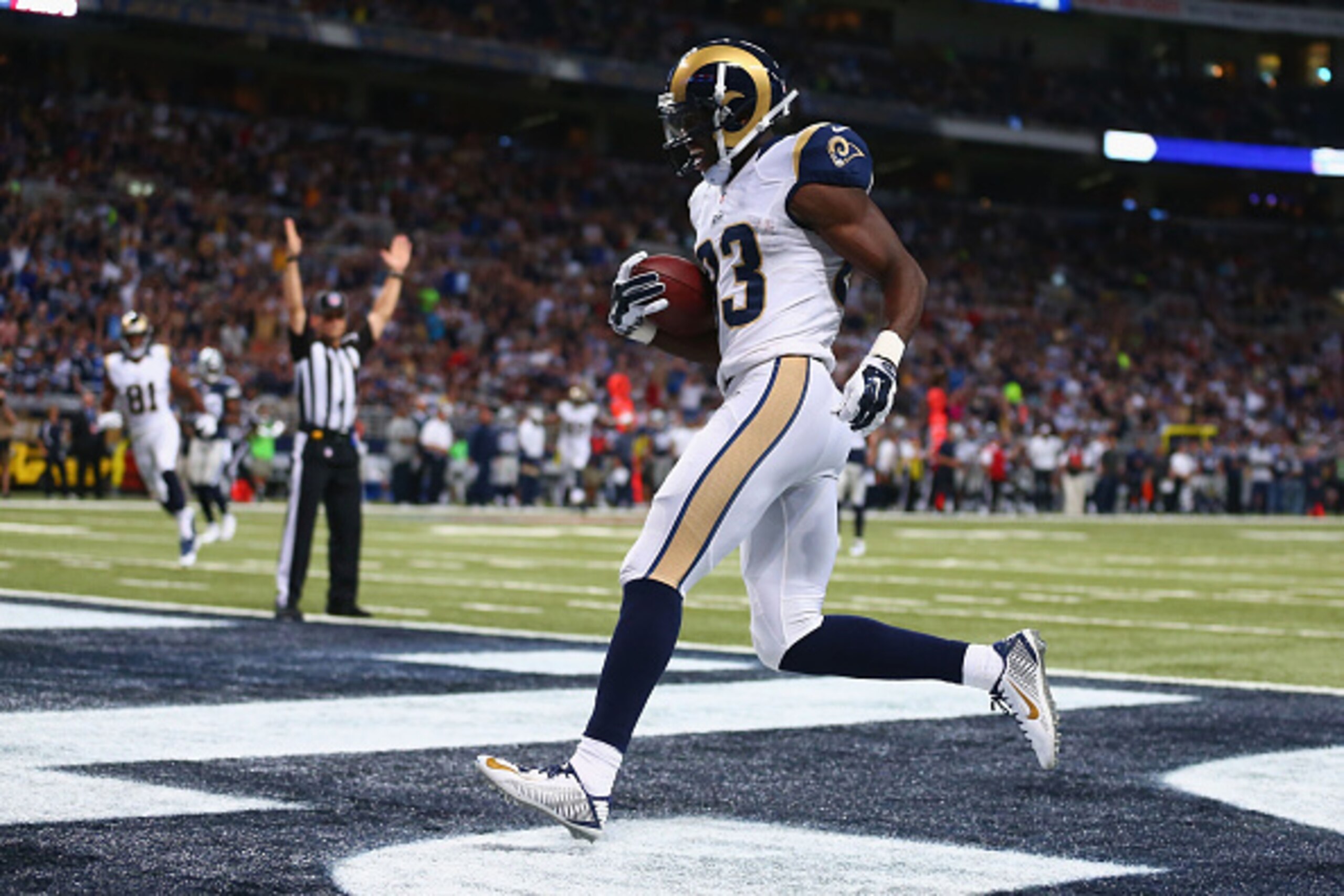ST. LOUIS, MO - SEPTEMBER 21: Brian Quick #83 of the St. Louis Rams scores a touchdown against the Dallas Cowboys in the second quarter at the Edward Jones Dome on September 21, 2014 in St. Louis, Missouri.  (Photo by Dilip Vishwanat/Getty Images)