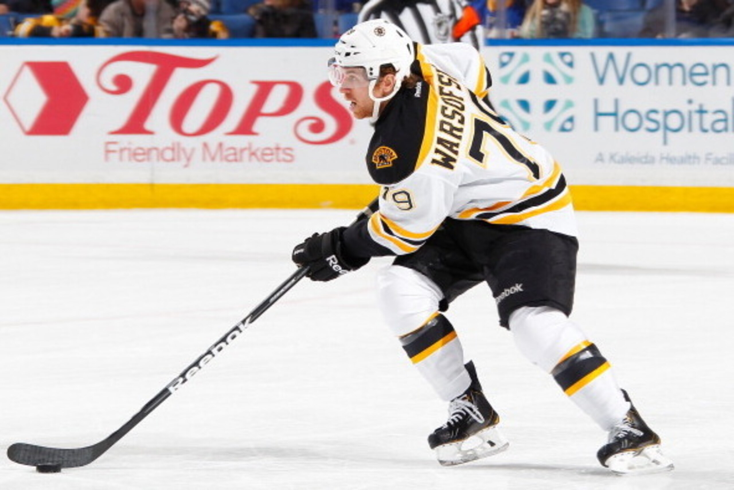 BUFFALO, NY - DECEMBER 19:  David Warsofsky #79 of the Boston Bruins skates against the Buffalo Sabres on December 19, 2013 at the First Niagara Center in Buffalo, New York.  (Photo by Bill Wippert/NHLI via Getty Images)
