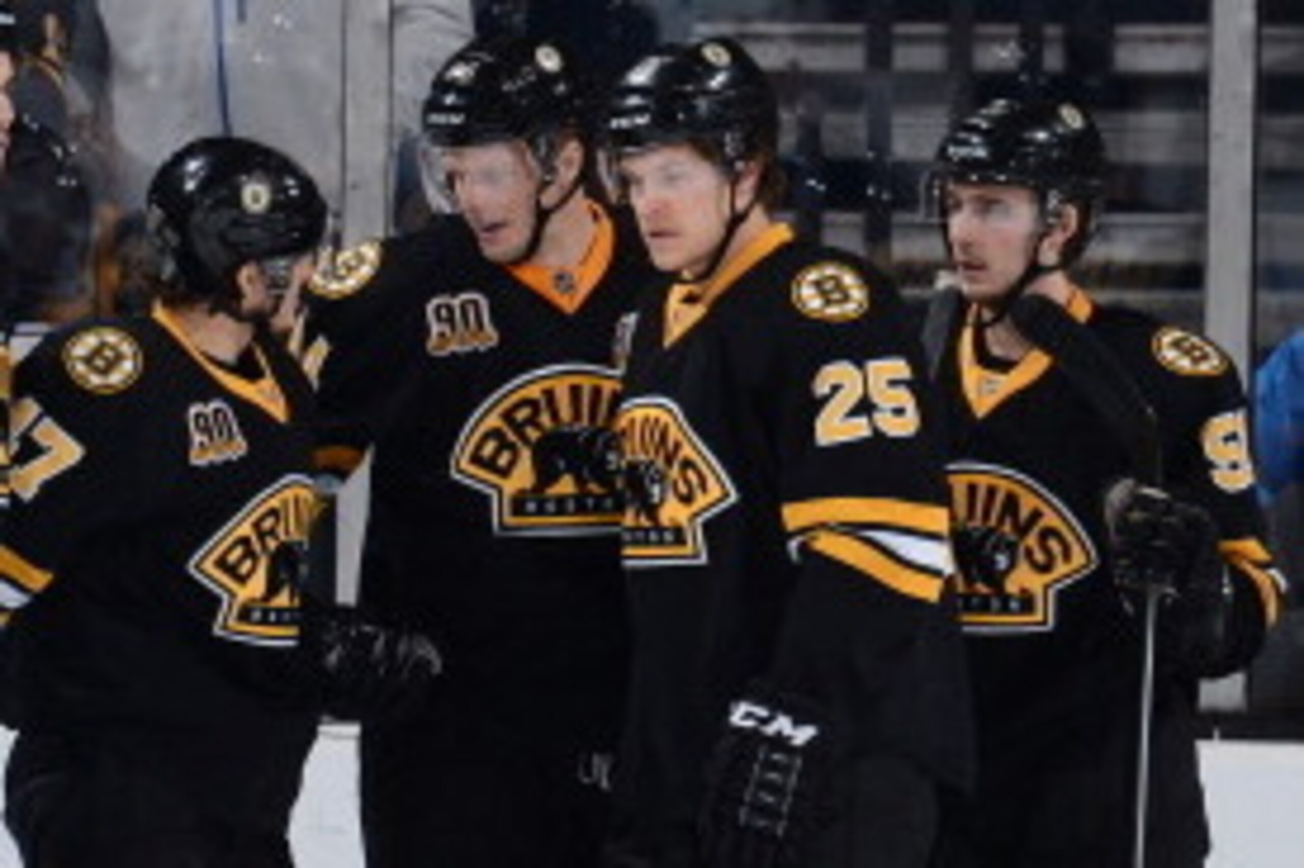 BOSTON, MA - JANUARY 4: Adam McQuaid #54, Torey Krug #47, Carl Soderberg #34, Matt Fraser #25 and Ryan Spooner #51 of the Boston Bruins celebrate a goal against the Winnipeg Jets at the TD Garden on January 4, 2014 in Boston, Massachusetts.  (Photo by Bri