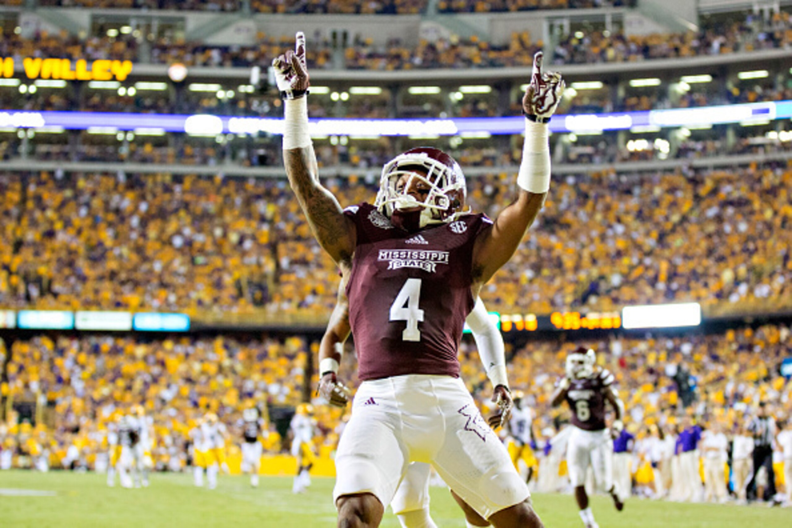 BATON ROUGE, LA - SEPTEMBER 20: Jameon Lewis #4 of the Mississippi State Bulldogs points to the crowd after scoring a touchdown against the LSU Tigers at Tiger Stadium on September 20, 2014 in Baton Rouge, Louisiana.  The Bulldogs defeated the Tigers 34-2