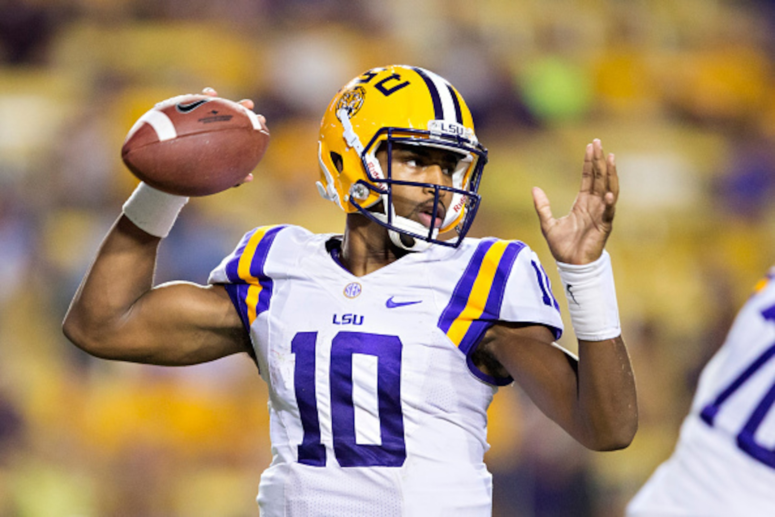 BATON ROUGE, LA - SEPTEMBER 20: Anthony Jennings #10 of the LSU Tigers throws a pass against the Mississippi State Bulldogs at Tiger Stadium on September 20, 2014 in Baton Rouge, Louisiana.  The Bulldogs defeated the Tigers 34-29.  (Photo by Wesley Hitt/G