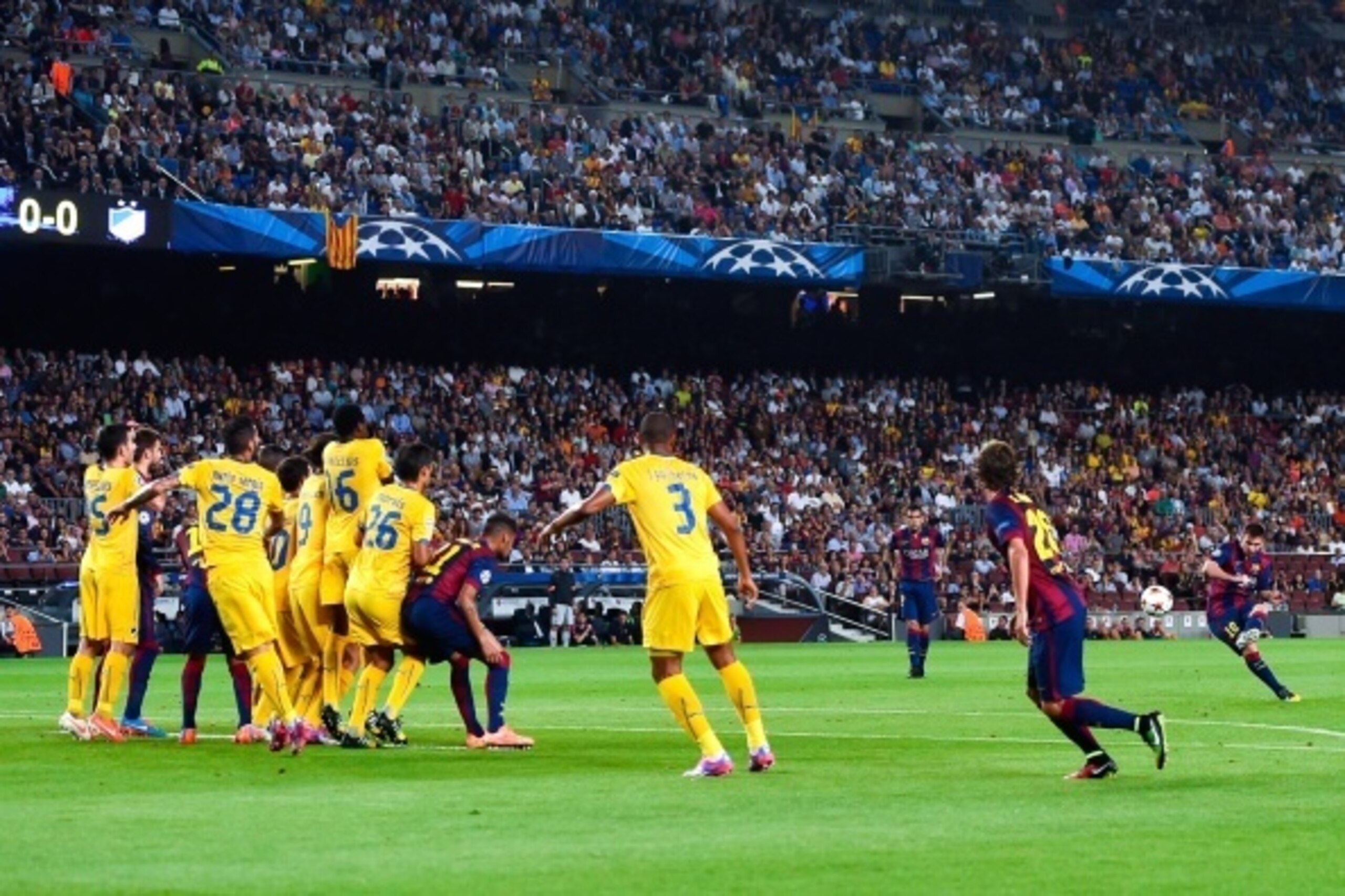BARCELONA, SPAIN - SEPTEMBER 17: Lionel Messi of FC Barcelona takes a free kick during the UEFA Champions League Group F match between FC Barcelona and APOEL FC at the Camp Nou Stadium on September 17, 2014 in Barcelona, Spain.  (Photo by David Ramos/Gett