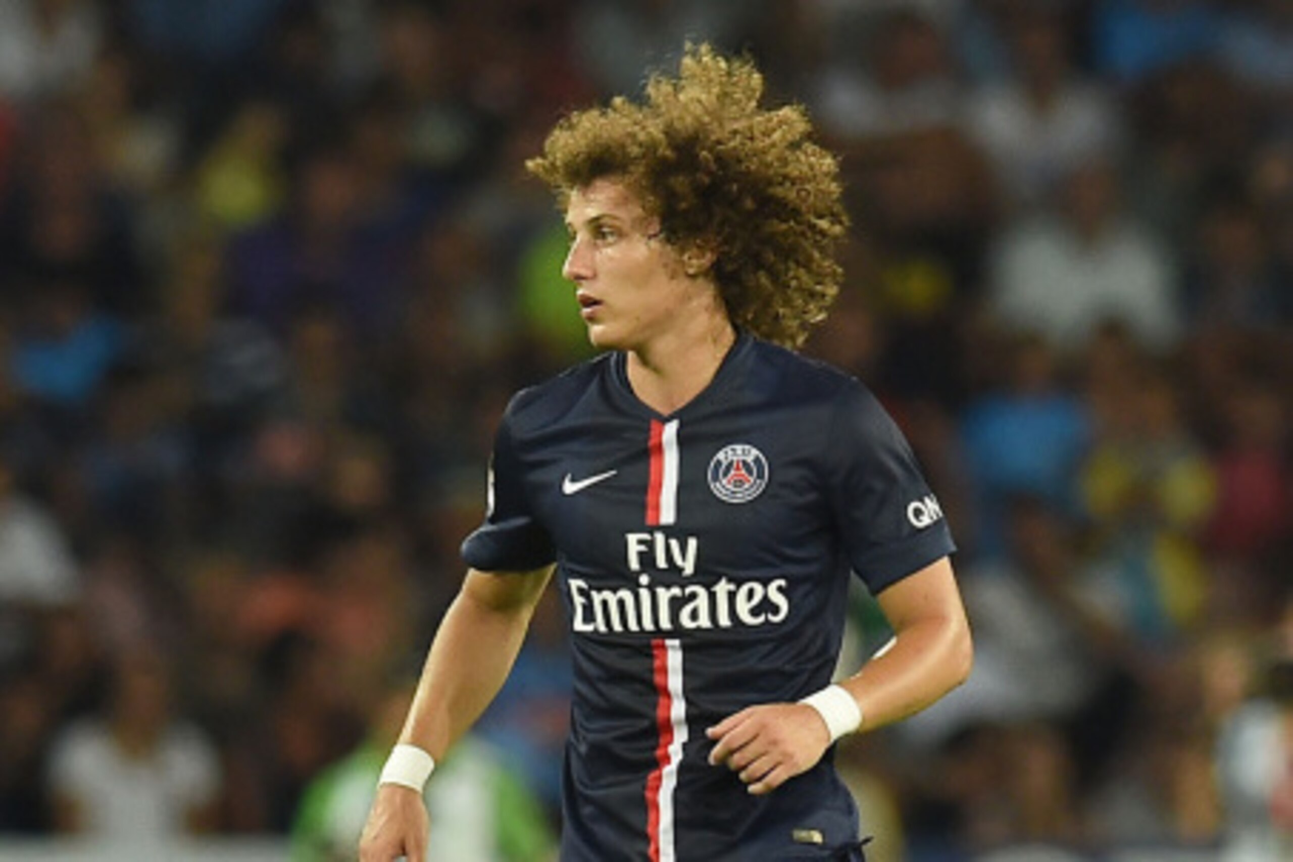 NAPLES, ITALY - AUGUST 11:  David Luiz of Paris Saint Germain  in action during the pre-season friendly match between SSC Napoli and Paris Saint-Germain FC at Stadio San Paolo on August 11, 2014 in Naples, Italy.  (Photo by Giuseppe Bellini/Getty Images)