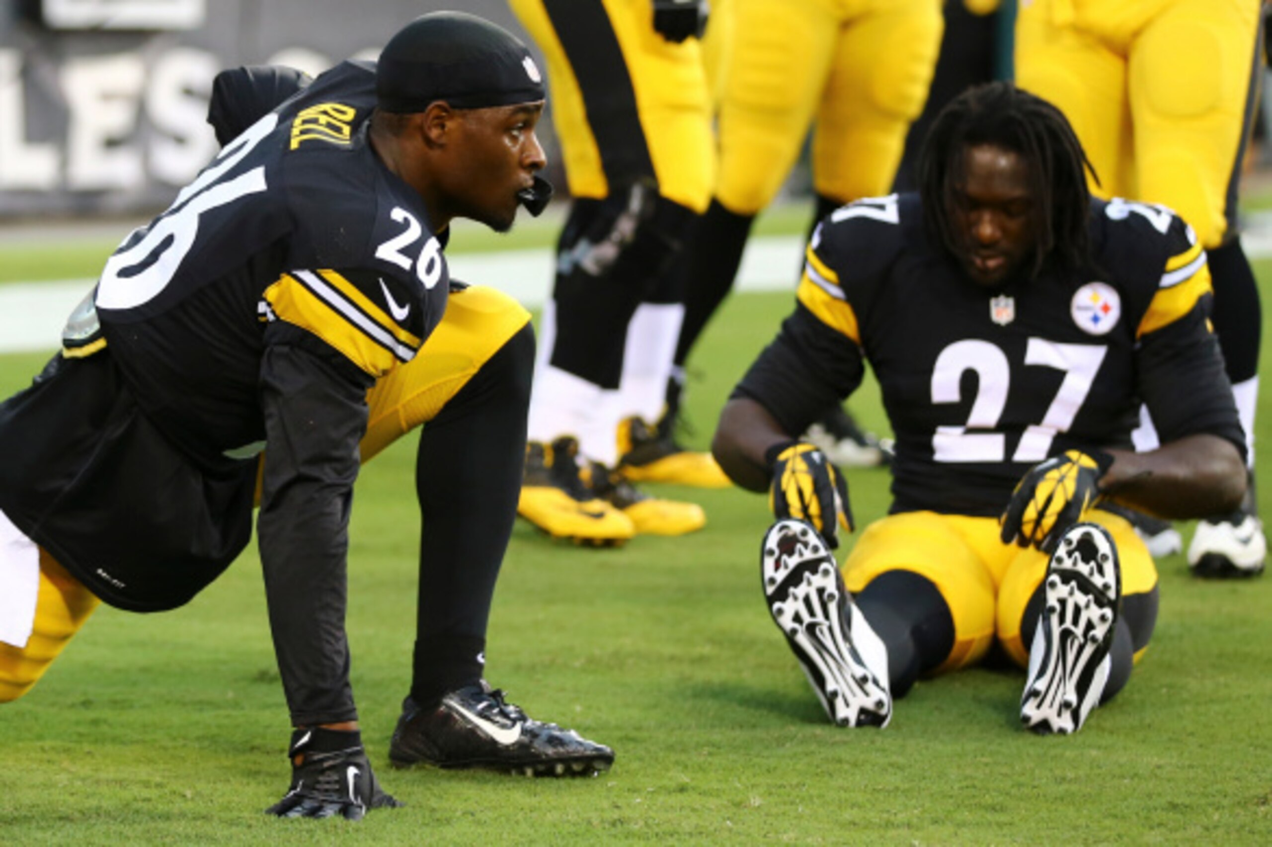 PHILADELPHIA, PA - AUGUST 21: Running backs Le'Veon Bell #26 and LeGarrette Blount #27 of the Pittsburgh Steelers warm up prior to the game against the Philadelphia Eagles on August 21, 2014 at Lincoln Financial Field in Philadelphia, Pennsylvania. (Photo