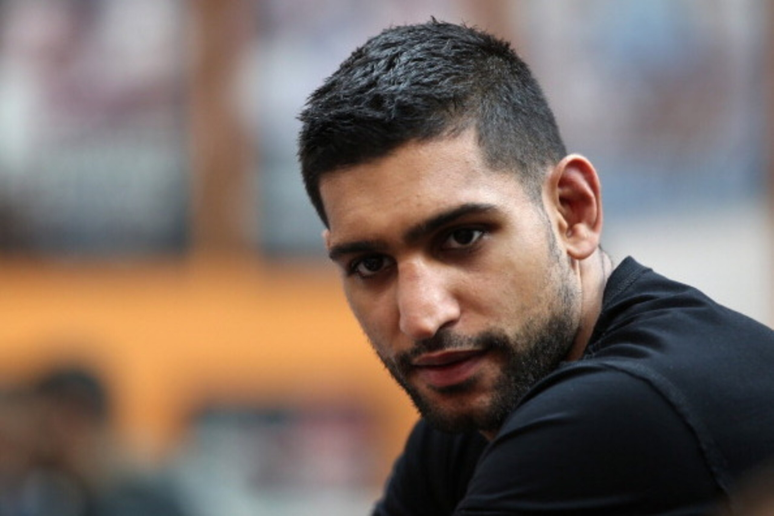 BOLTON, ENGLAND - MAY 12:  Amir Khan answers questions from the media during the launch of The Amir Khan Foundation at the at the Gloves Community Centre on May 12, 2014 in Bolton, England.  (Photo by Jan Kruger/Getty Images)
