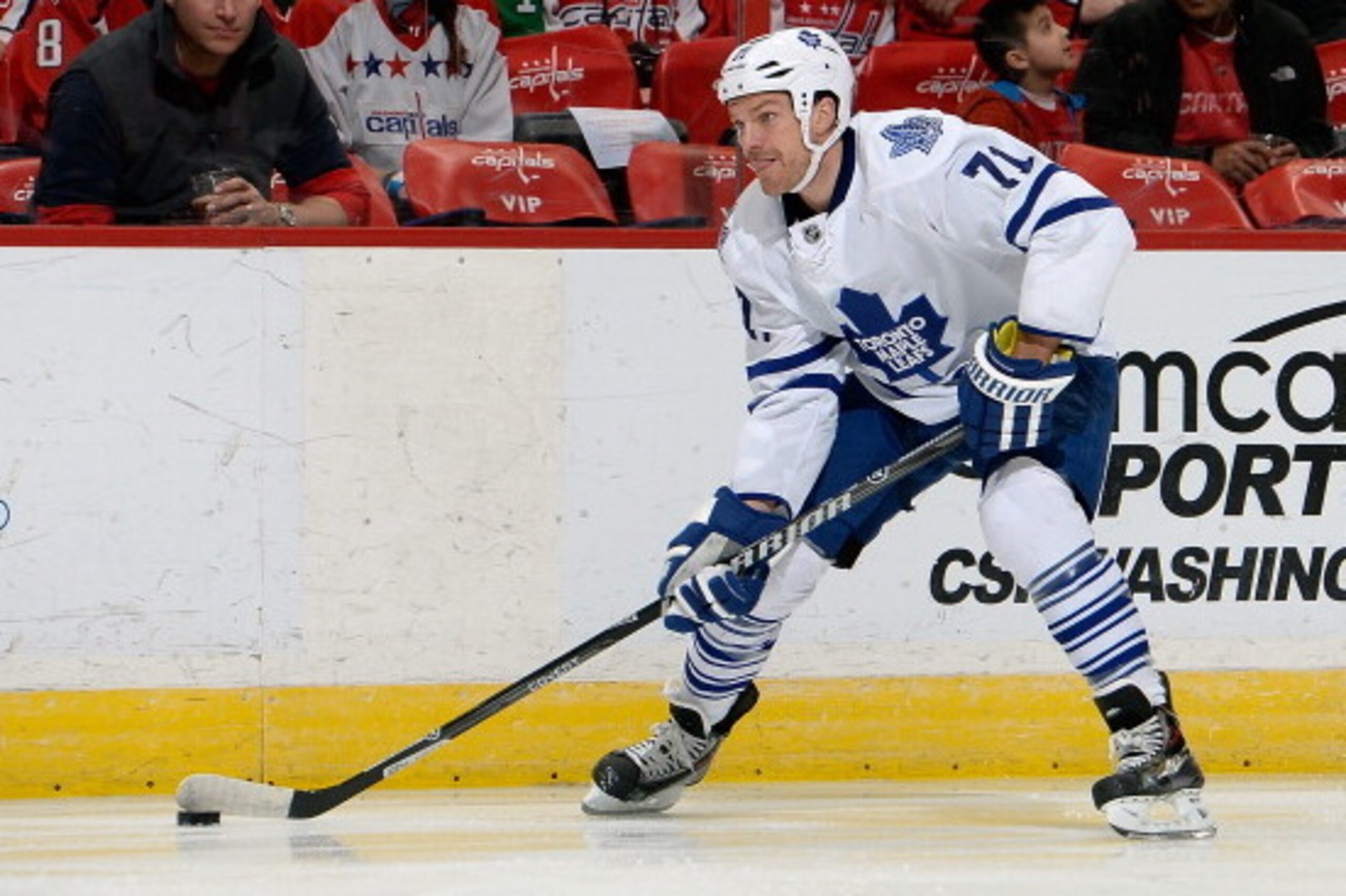 WASHINGTON, DC - MARCH 16:  David Clarkson #71 of the Toronto Maple Leafs moves the puck up ice in the first period during an NHL game against the Washington Capitals at Verizon Center on March 16, 2014 in Washington, DC.  (Photo by Patrick McDermott/NHLI