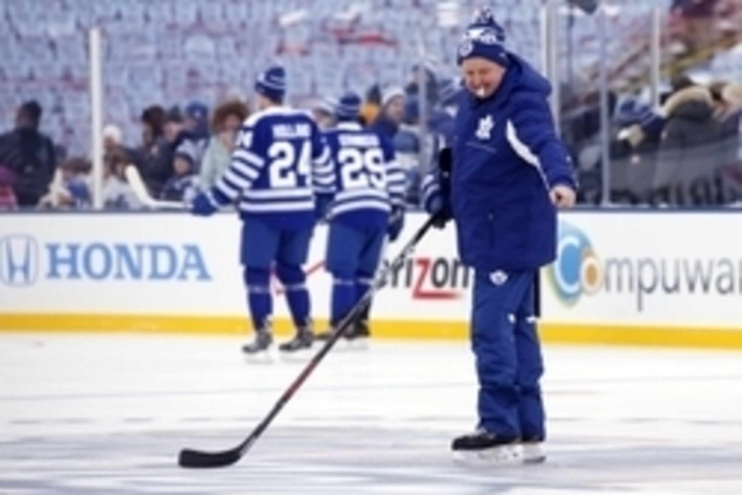 Dec 31, 2013; Ann Arbor, MI, USA; Toronto Maple Leafs head coach Randy Carlyle (right) during practice the day before the Winter Classic hockey game against the Detroit Red Wings at Michigan Stadium. Mandatory Credit: Rick Osentoski-USA TODAY Sports