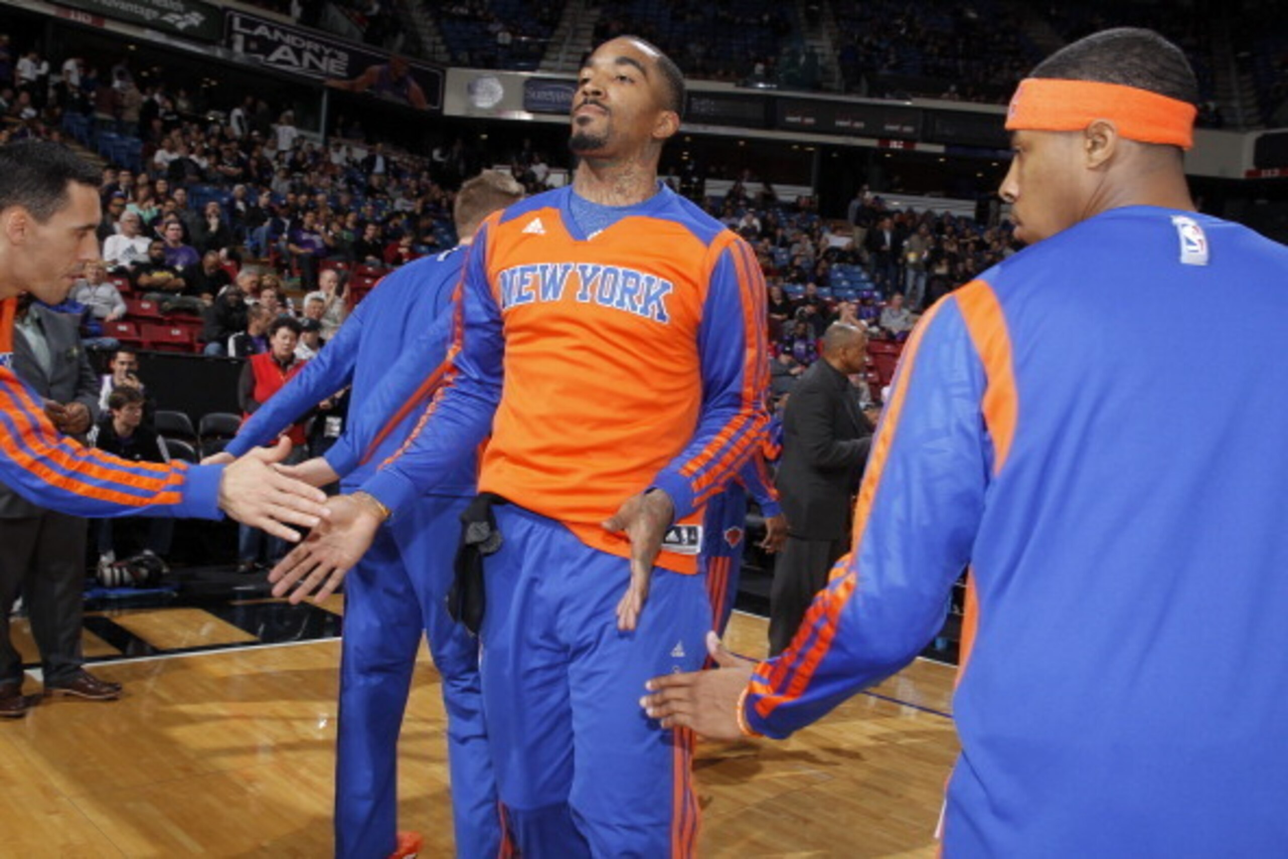 SACRAMENTO, CA - MARCH 26: J.R. Smith #8 of the New York Knicks gets introduced into the starting lineup against the Sacramento Kings on March 26, 2014 at Sleep Train Arena in Sacramento, California. NOTE TO USER: User expressly acknowledges and agrees th