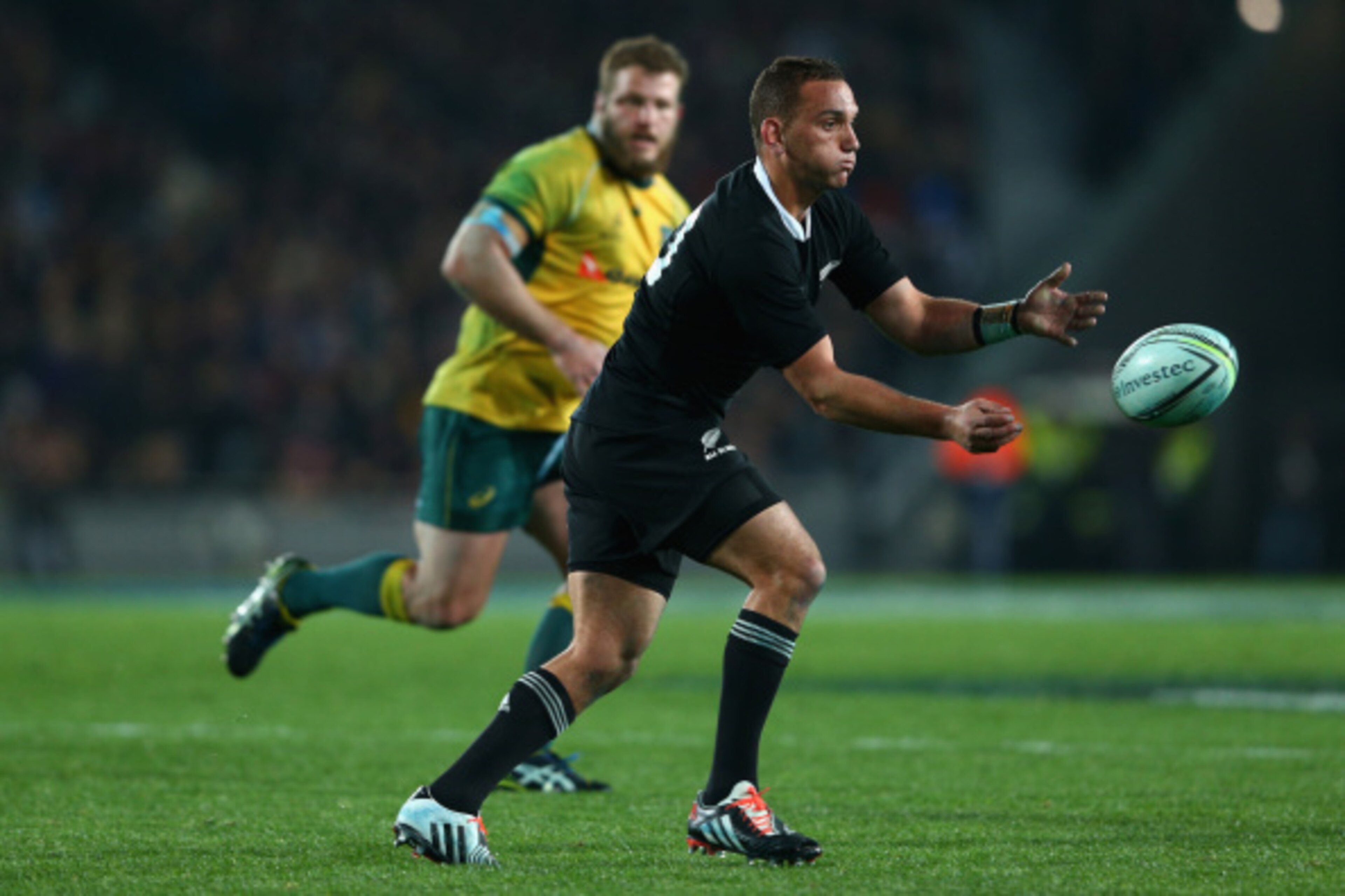 AUCKLAND, NEW ZEALAND - AUGUST 23: Aaron Cruden of the All Blacks passes during The Rugby Championship match between the New Zealand All Blacks and the Australian Wallabies at Eden Park on August 23, 2014 in Auckland, New Zealand.  (Photo by Cameron Spenc