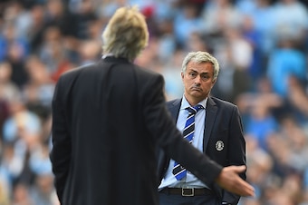 MANCHESTER, ENGLAND - SEPTEMBER 21: Jose Mourinho of Chelsea speaks with Manuel Pellegrini of Manchester City during the Barclays Premier League match between Manchester City and Chelsea at Etihad Stadium on September 21, 2014 in Manchester, England.  (Ph