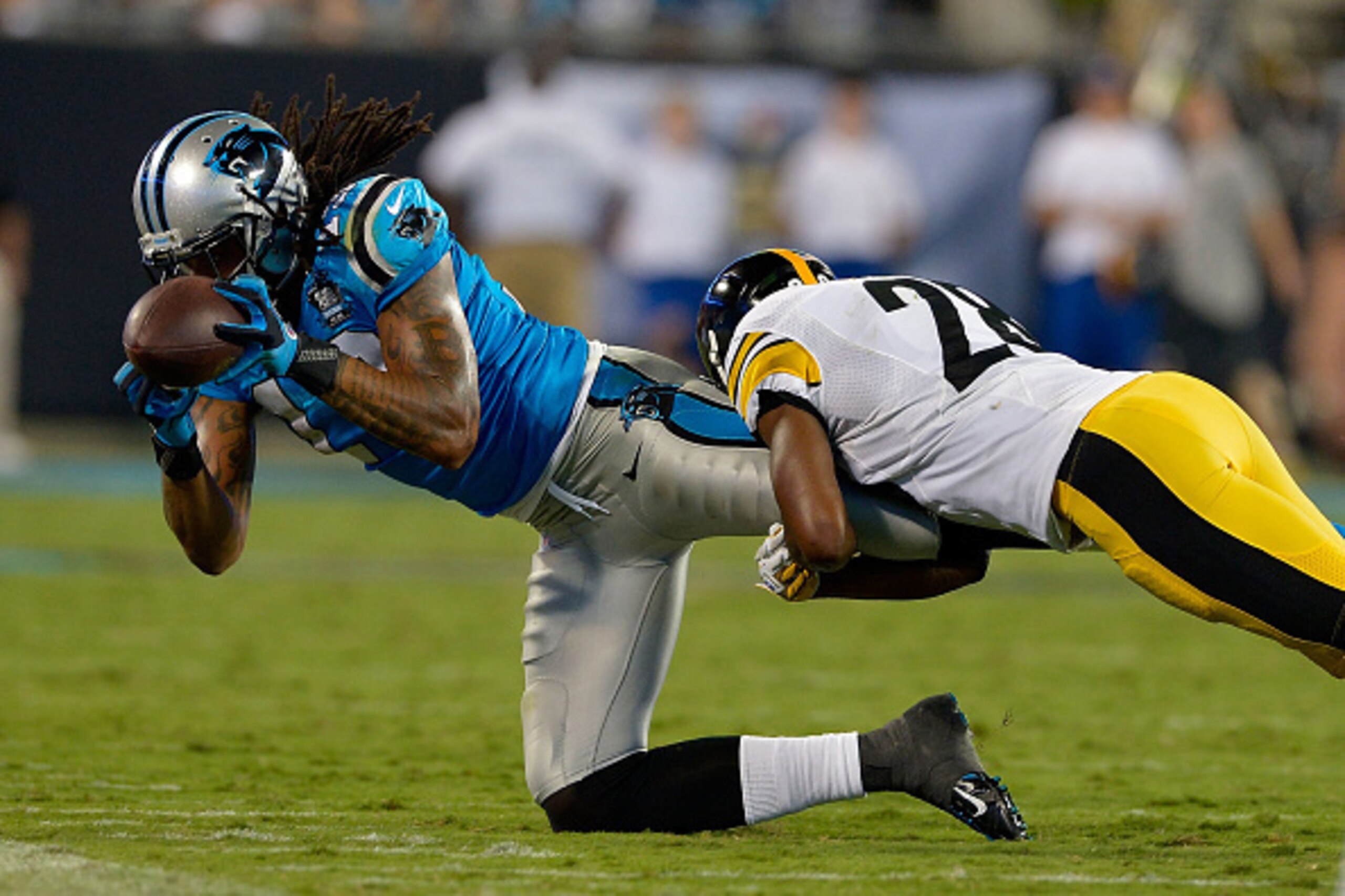 CHARLOTTE, NC - SEPTEMBER 21: Kelvin Benjamin #13 of the Carolina Panthers catches the ball against the Pittsburgh Steelers in the 3rd quarter during their game at Bank of America Stadium on September 21, 2014 in Charlotte, North Carolina. (Photo by Grant