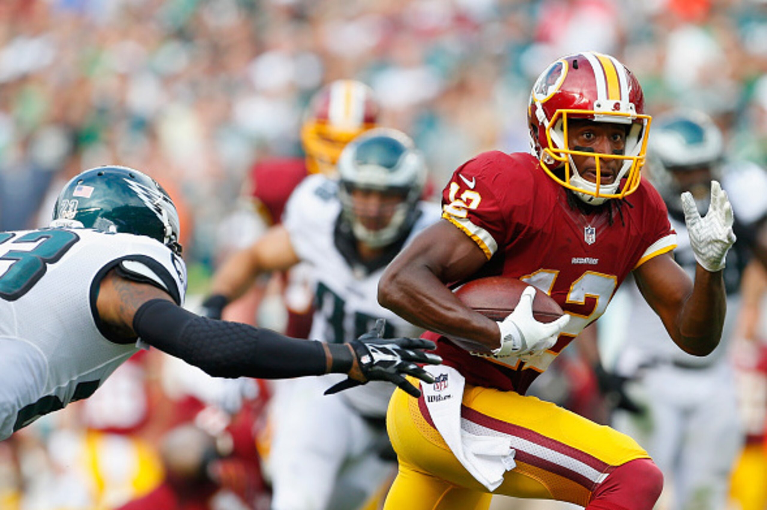 PHILADELPHIA, PA - SEPTEMBER 21: Andre Roberts #12 of the Washington Redskins runs the ball against Nolan Carroll #23 of the Philadelphia Eagles at Lincoln Financial Field on September 21, 2014 in Philadelphia, Pennsylvania. (Photo by Rich Schultz/Get PHILADELPHIA, PA - SEPTEMBER 21: Andre Roberts #12 of the Washington Redskins runs the ball against Nolan Carroll #23 of the Philadelphia Eagles at Lincoln Financial Field on September 21, 2014 in Philadelphia, Pennsylvania. (Photo by Rich Schultz/Get