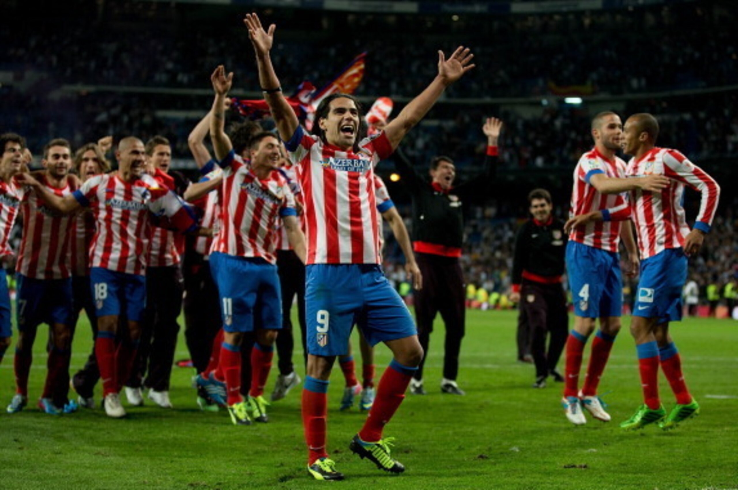 MADRID, SPAIN - MAY 17:  Radamel Falcao of Atletico de Madrid celebrates winning the match with teammates after finishing the Copa del Rey Final match between Real Madrid CF and Club Atletico de Madrid at Estadio Santiago Bernabeu on May 17, 2013 in Madri