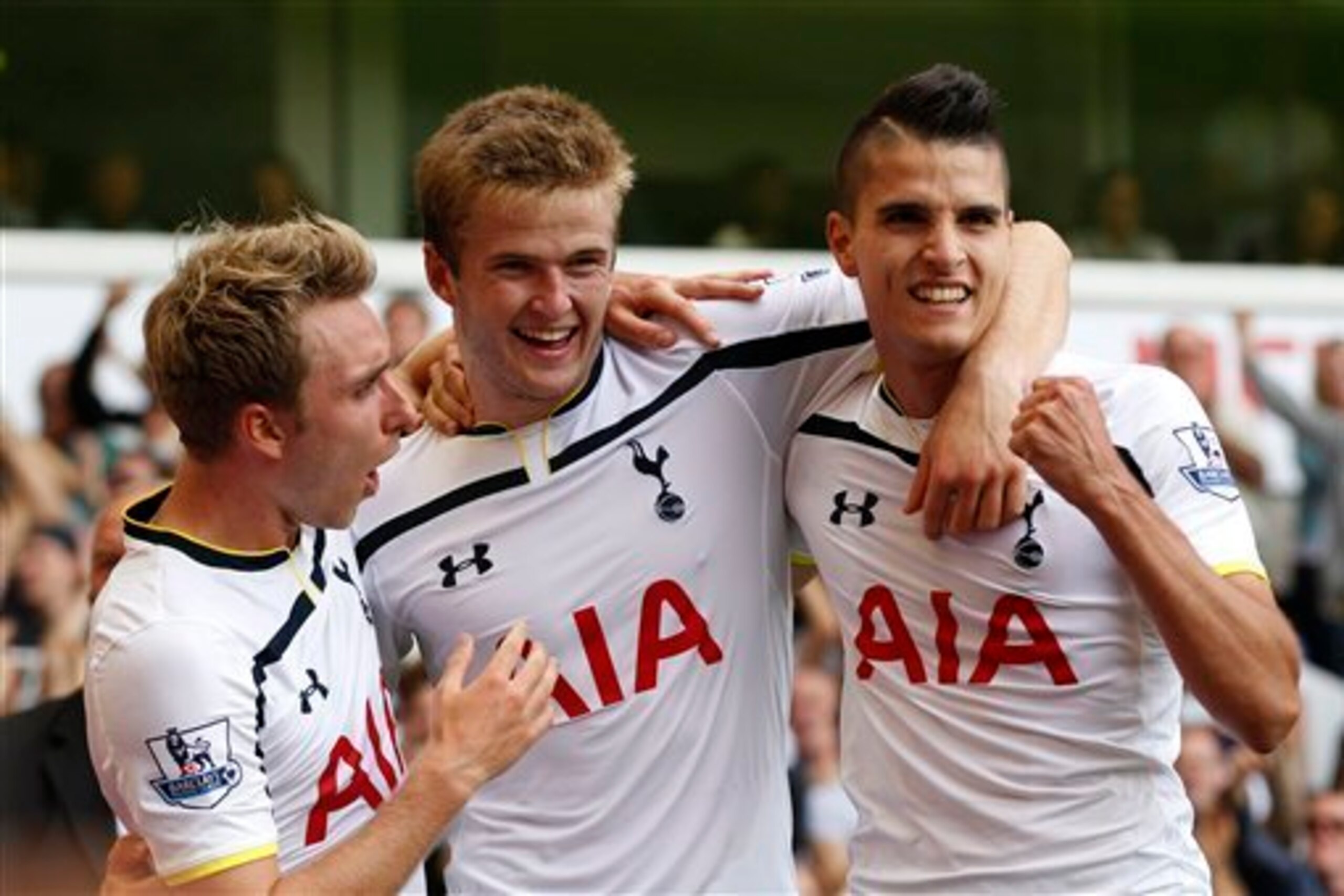 Eriksen (left) and Erik Lamela (right) have been a big part of Spurs' attacking set-up so far this season.