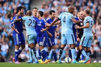 MANCHESTER, ENGLAND - SEPTEMBER 21:   Pablo Zabaleta of Manchester City is separated from Diego Costa of Chelsea by his team-mates during the Barclays Premier League match between Manchester City and Chelsea at the Etihad Stadium on September 21, 2014 in 