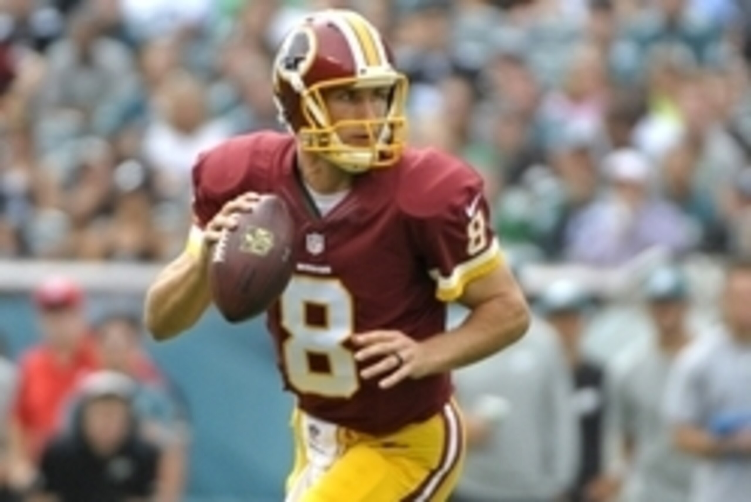 Sep 21, 2014; Philadelphia, PA, USA; Washington Redskins quarterback Kirk Cousins (8) looks for a receiver against the Philadelphia Eagles at Lincoln Financial Field. Mandatory Credit: Eric Hartline-USA TODAY Sports