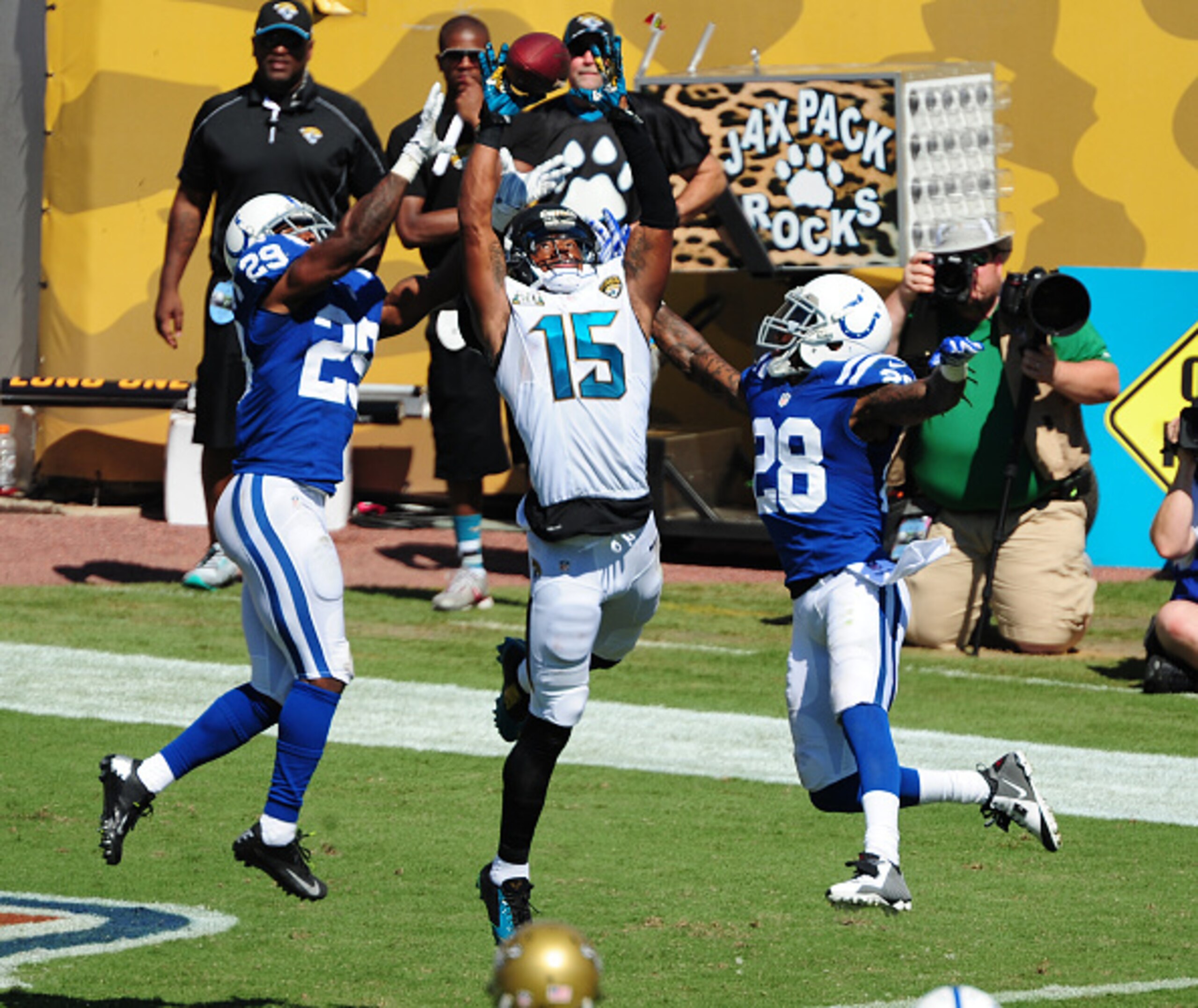 JACKSONVILLE, FL - SEPTEMBER 21: Allen Robinson #15 of the Jacksonville Jaguars goes up for a pass against Greg Toler #28 and Mike Adams #29 of the Indianapolis Colts at EverBank Field on September 21, 2014 in Jacksonville, Florida. (Photo by Scott Cunnin